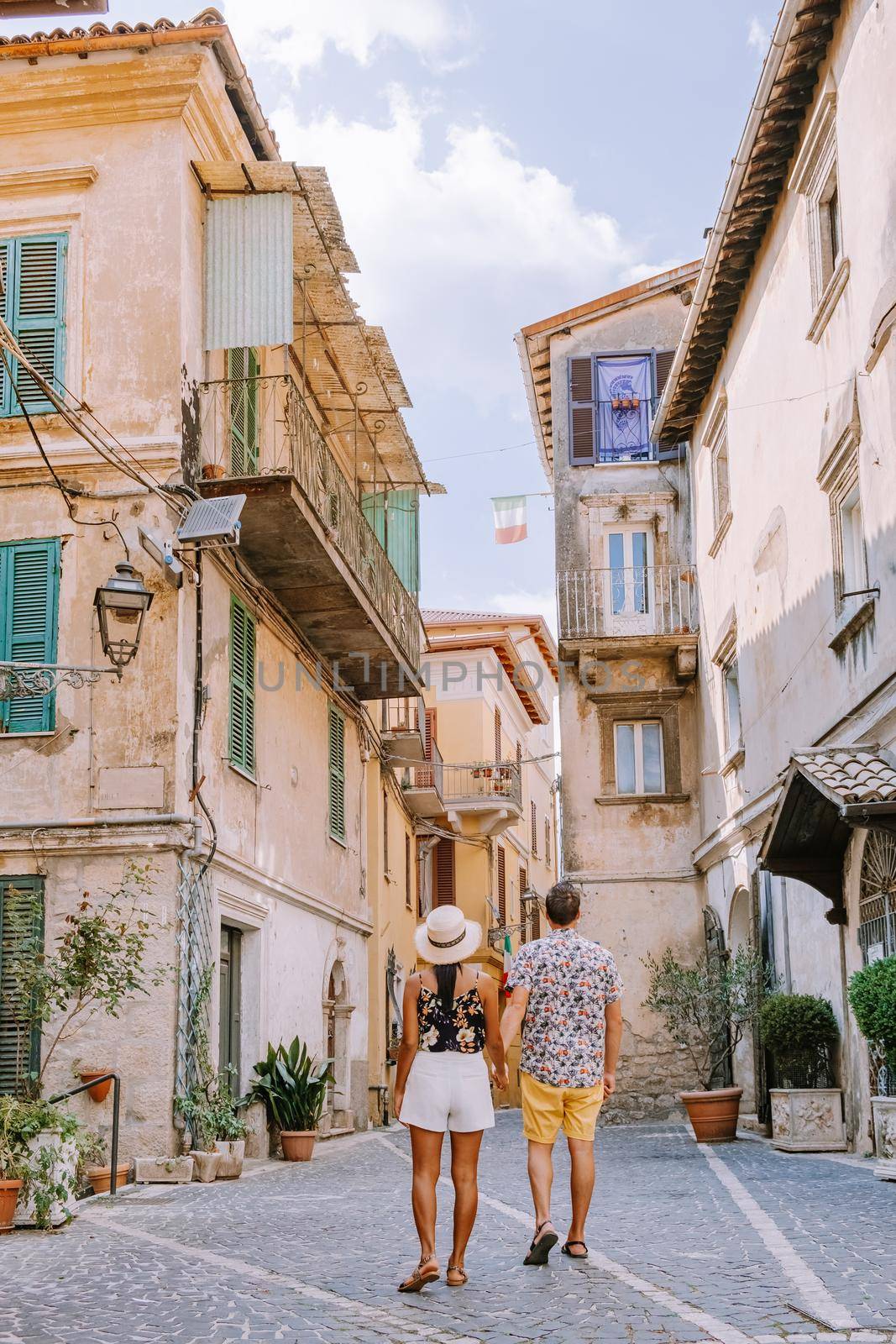 Overview of Fiuggi in Italy, Scenic sight in Fiuggi, province of Frosinone, Lazio, central Italy. Europe, couple walking on the colorful streets of Fiuggi