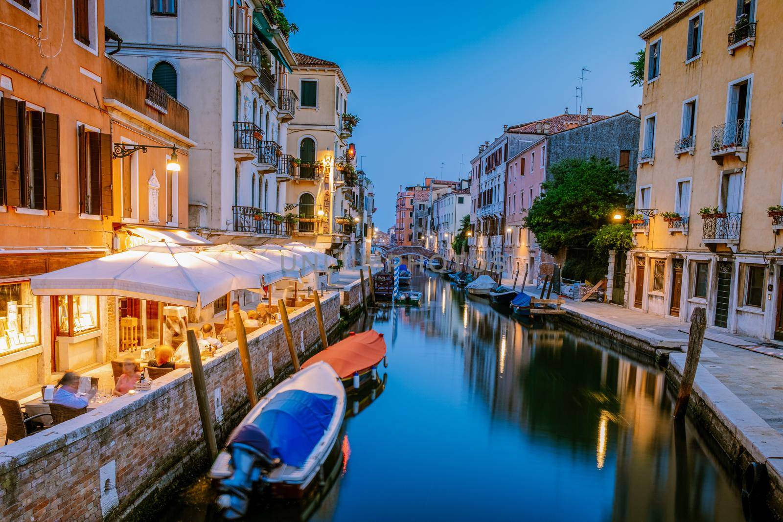 Beautiful venetian street in summer day, Italy. Venice Europe