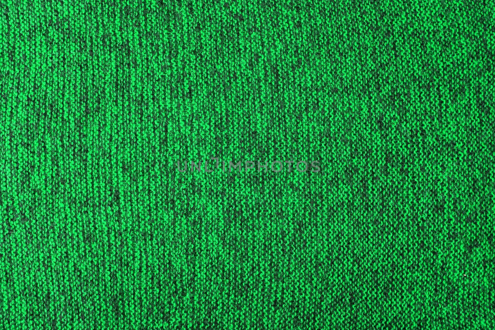 mixed green and black knitted texture and flat background