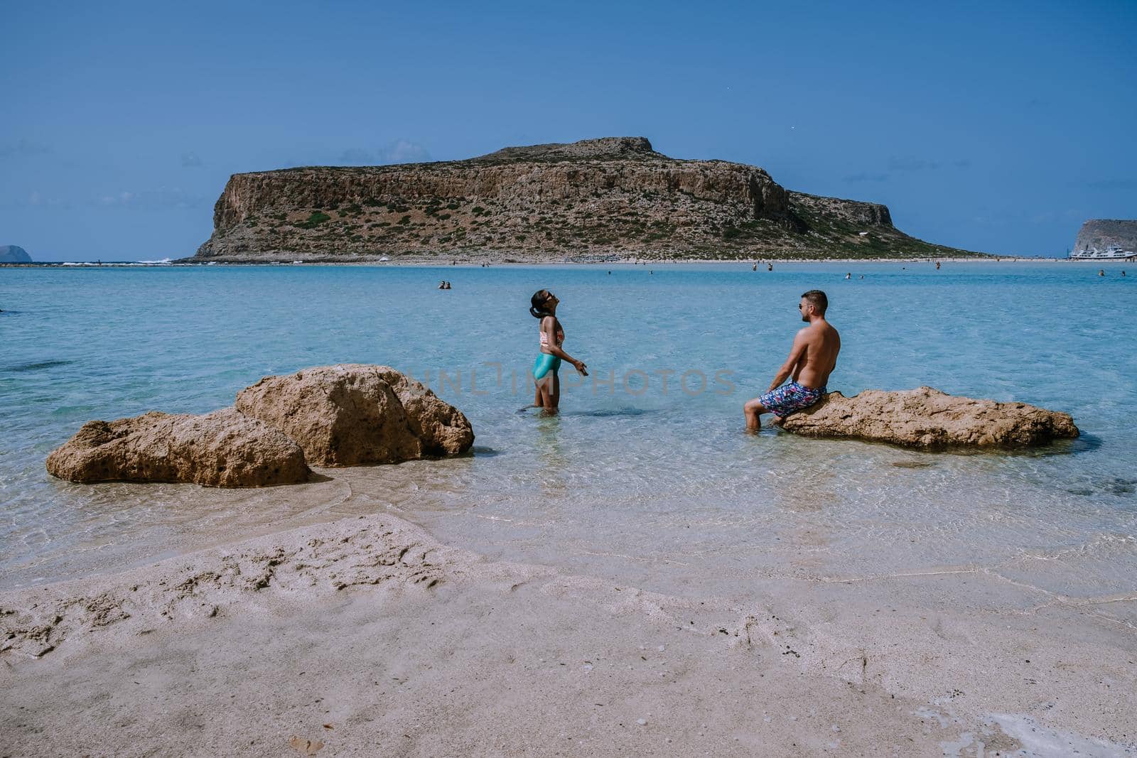 Balos Beach Cret Greece, Balos beach is on of the most beautiful beaches in Greece at the Greek Island couple visit the beach during vacation holiday in Greece