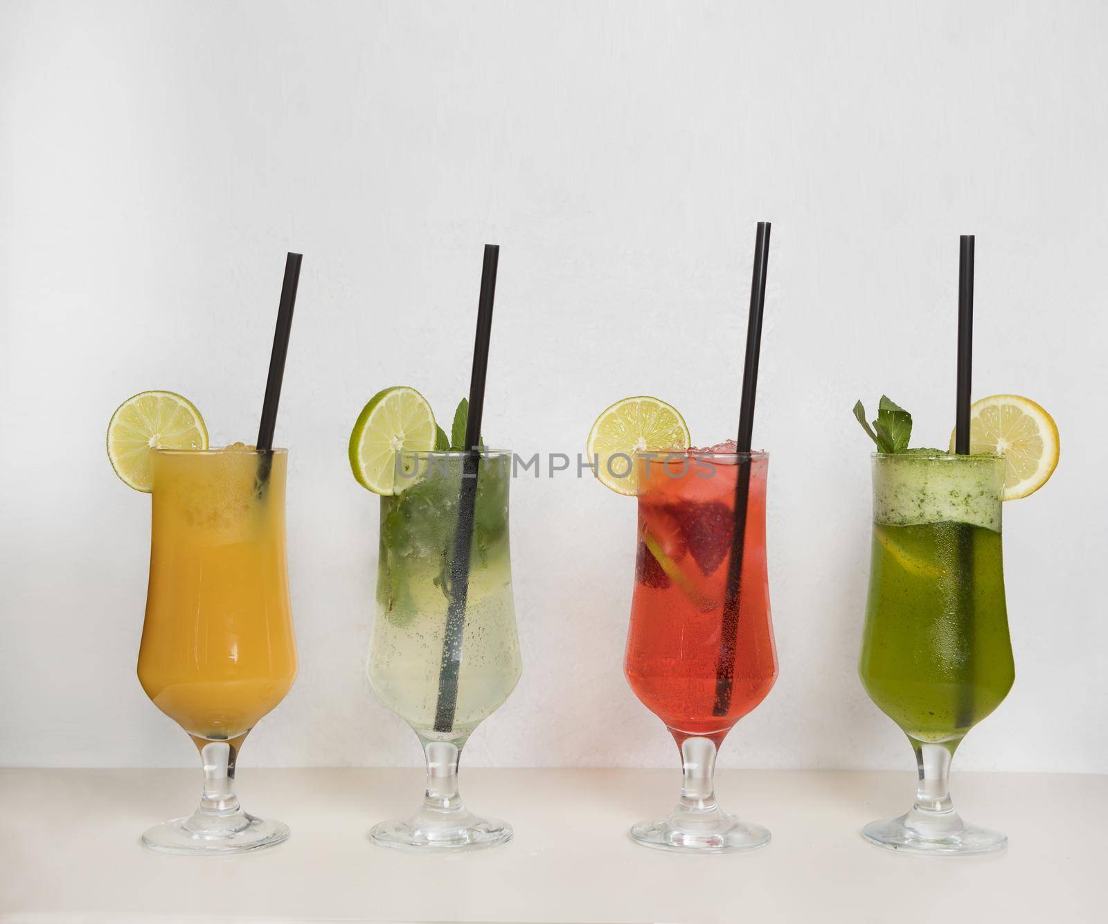 Fruit juice cocktails on a isolated white background by ferhad