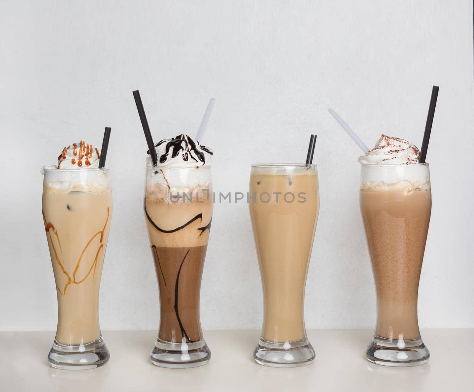 Fruit milky cocktails on a isolated white background