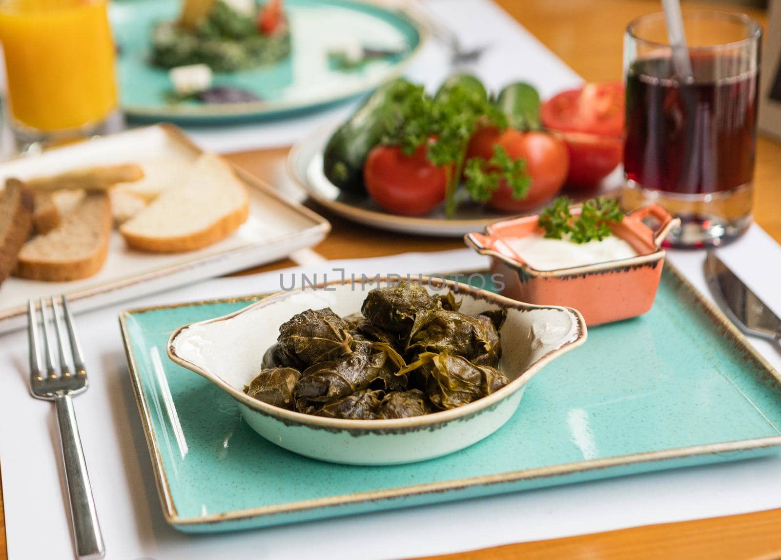 Tasty meat meal, dolma with vegetables on the table by ferhad