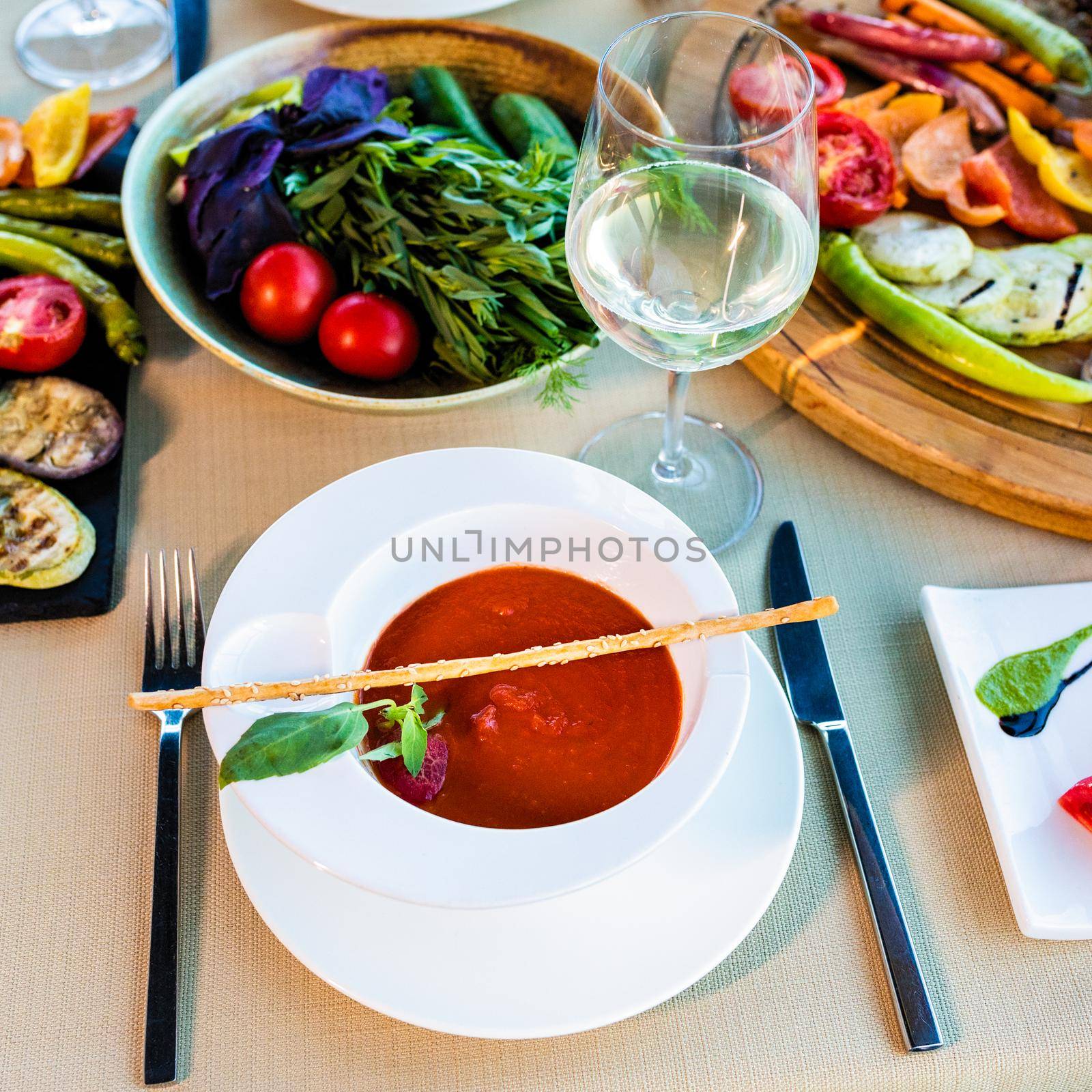 Tasty red tomato soup and vegetable with white wine by ferhad