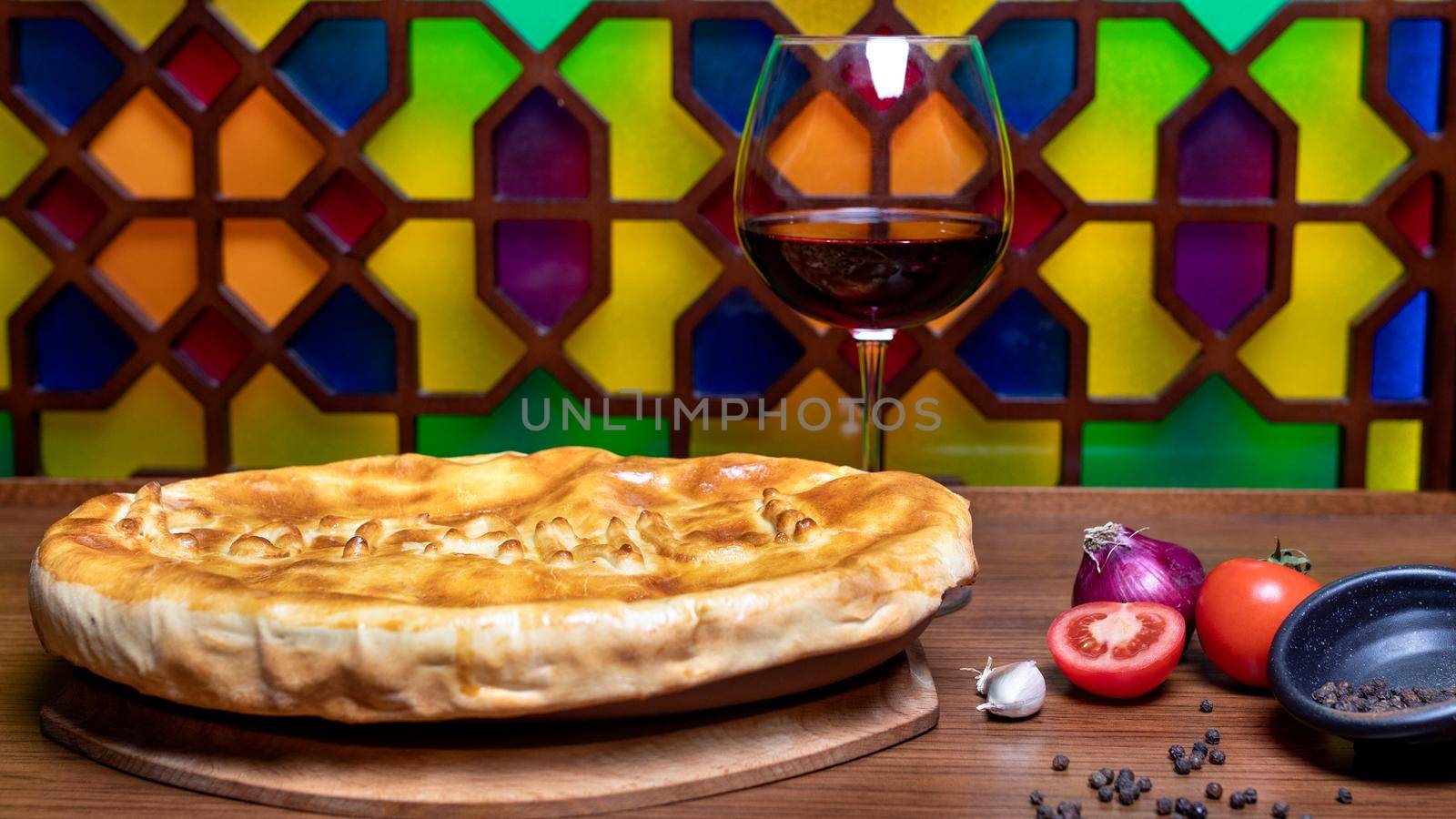 Tasty meat meal with bread, wine glass by ferhad