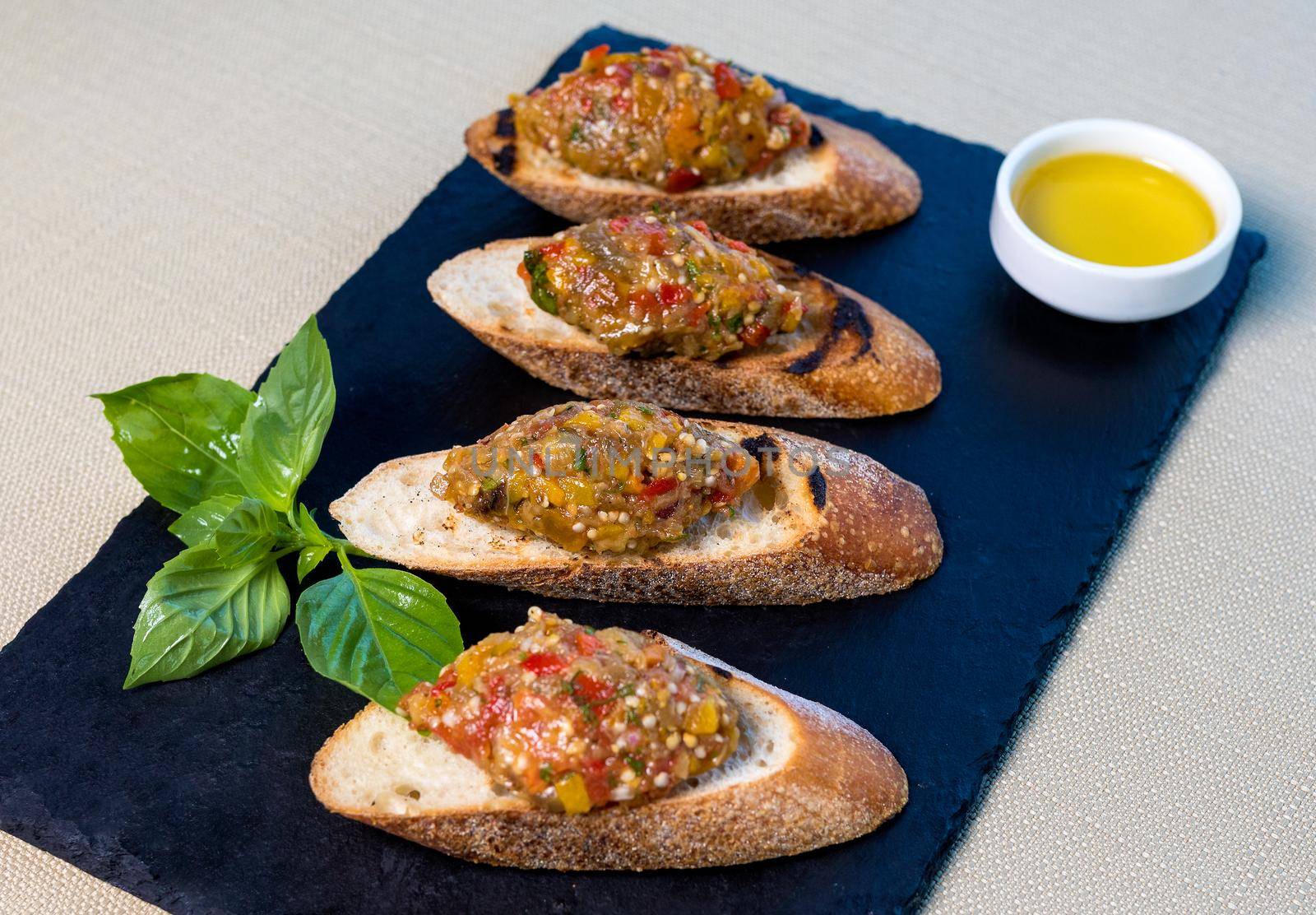 Eggplant salad on the small bread, tapas garnish by ferhad