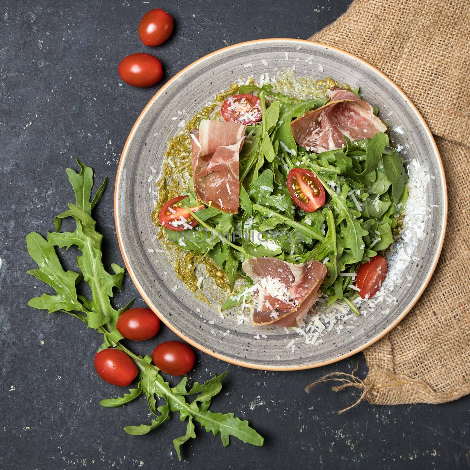 Raw beef meat meal with herbs salad top view by ferhad