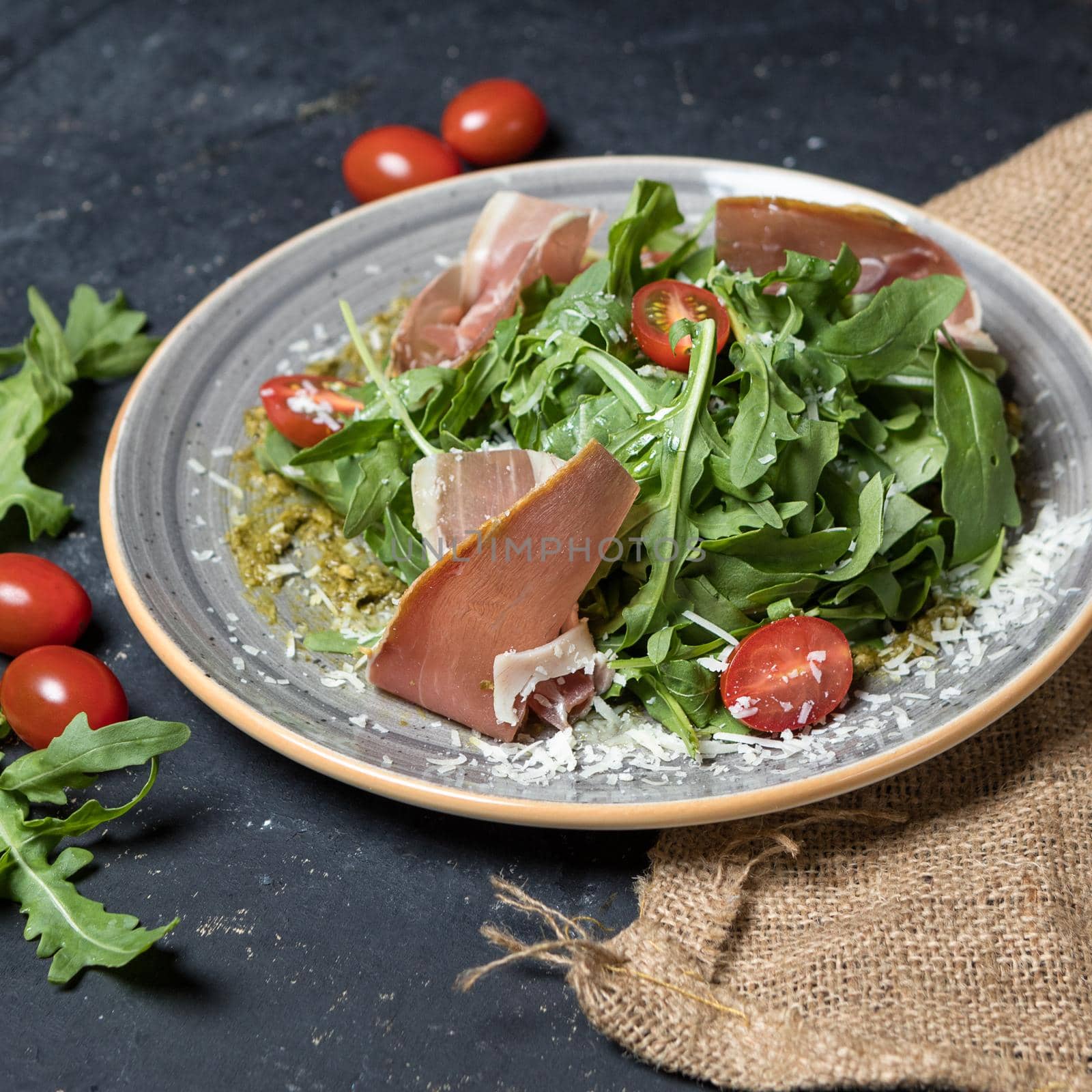 Raw beef meat meal with herbs salad by ferhad