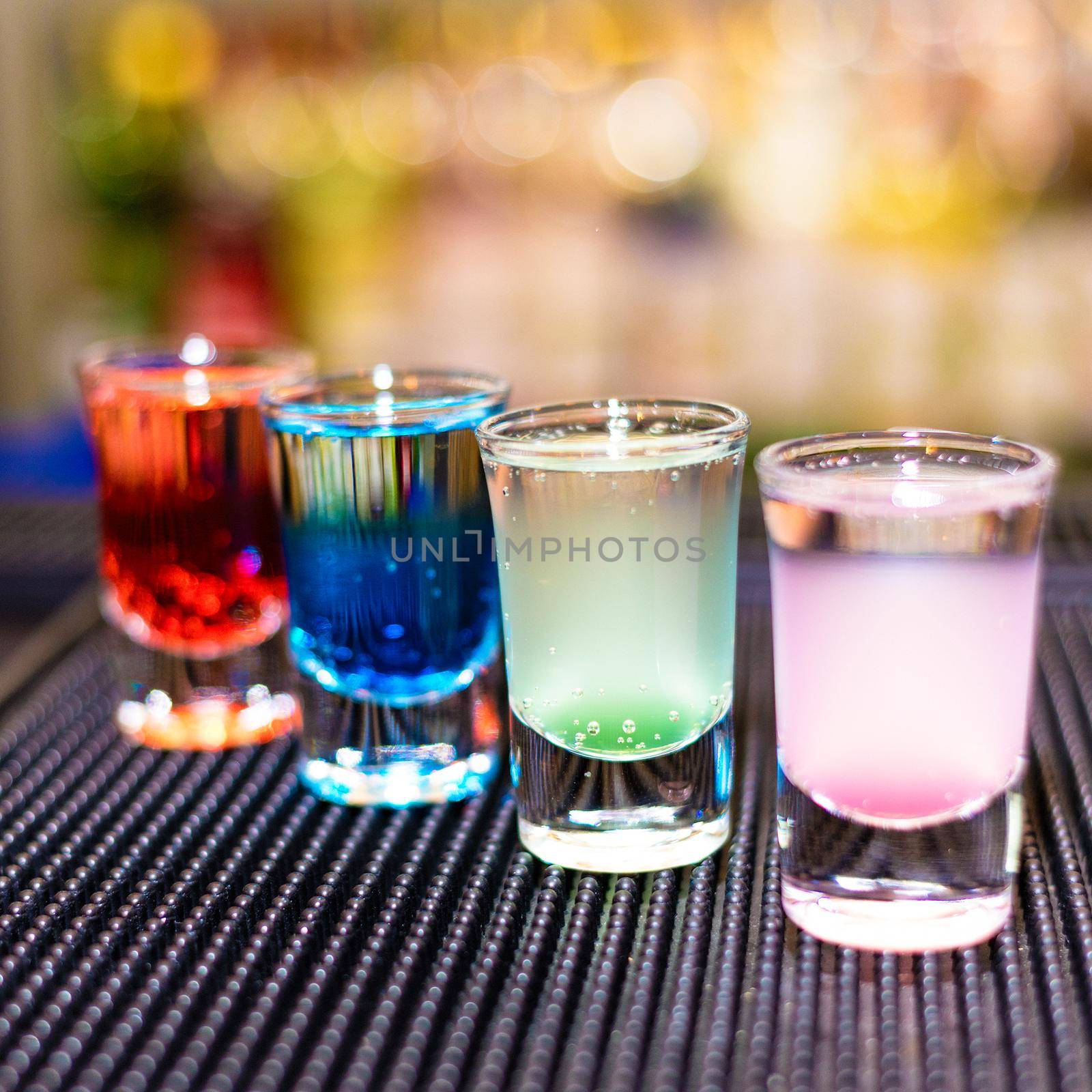 Colorful alcohol cocktails with blur background