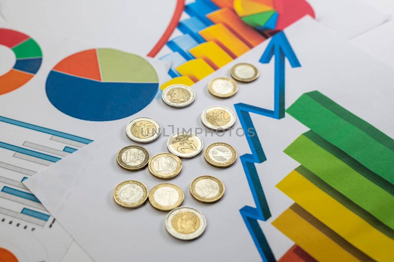 euro coins different denominations with statistics as colorful background