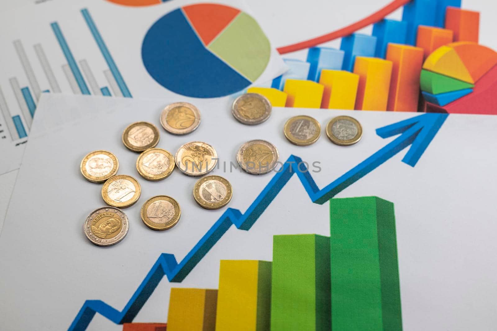 euro coins different denominations with statistics as colorful background