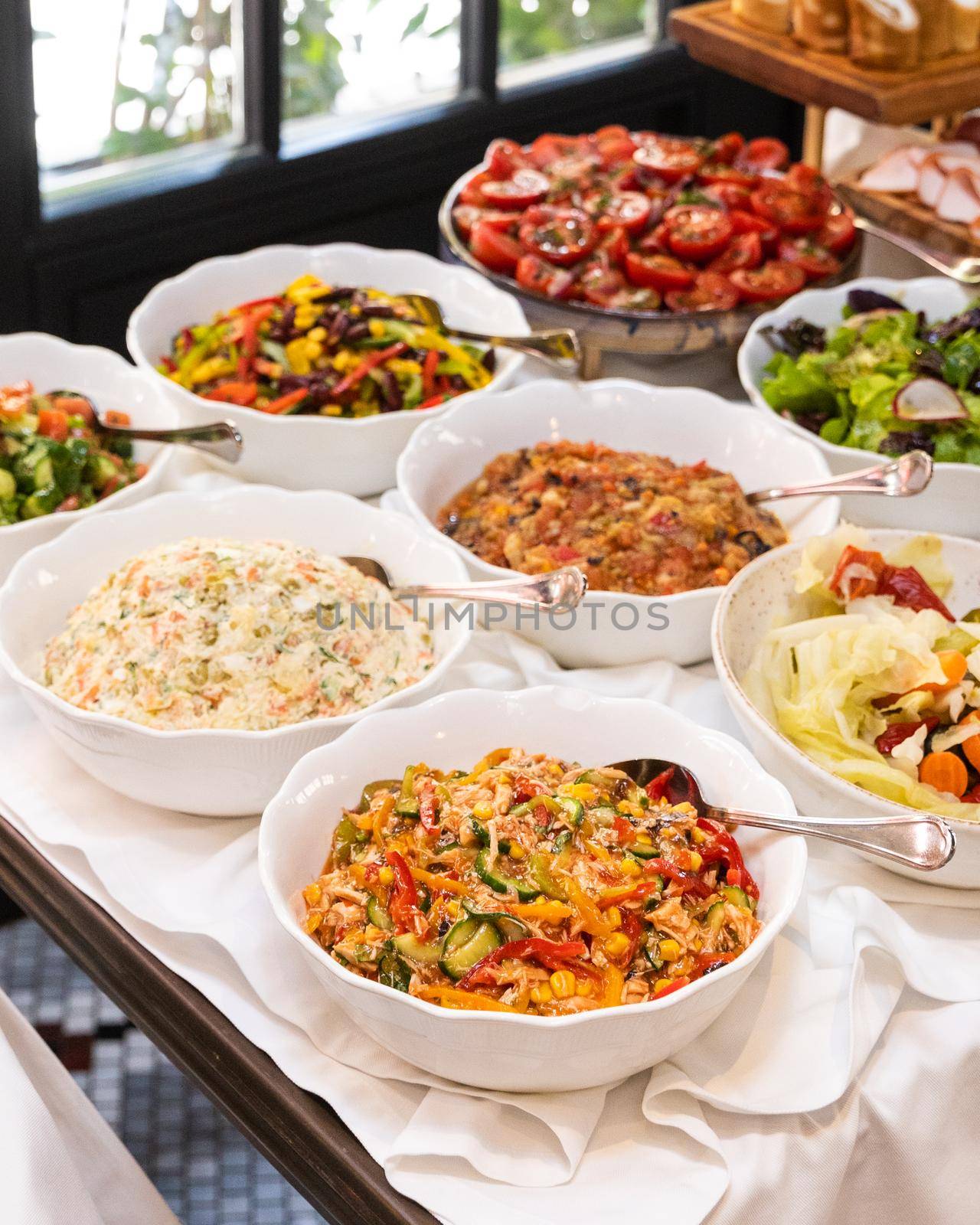 Different salads on the white table by ferhad