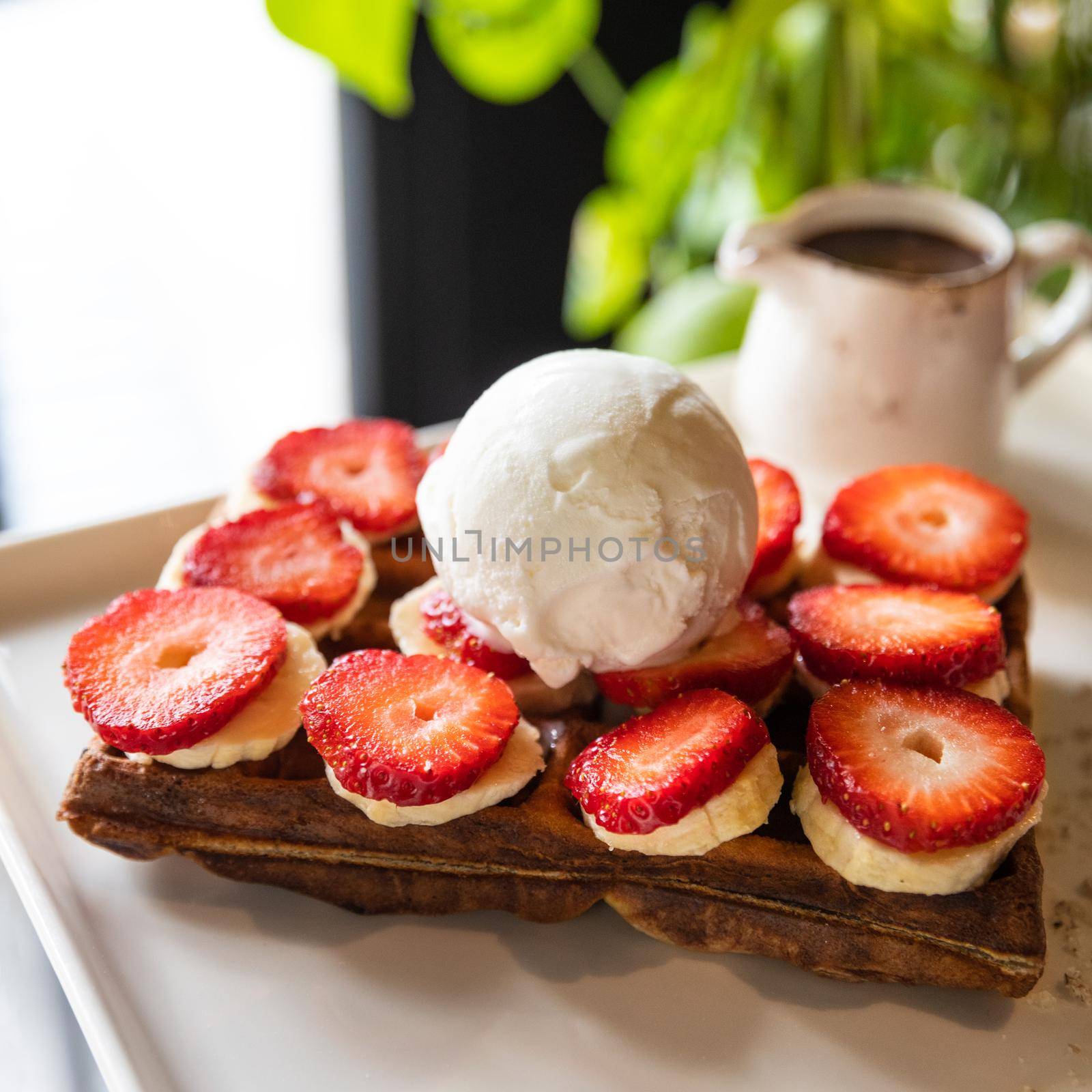 Tasty strawberry snack, garnish on the wooden plate by ferhad