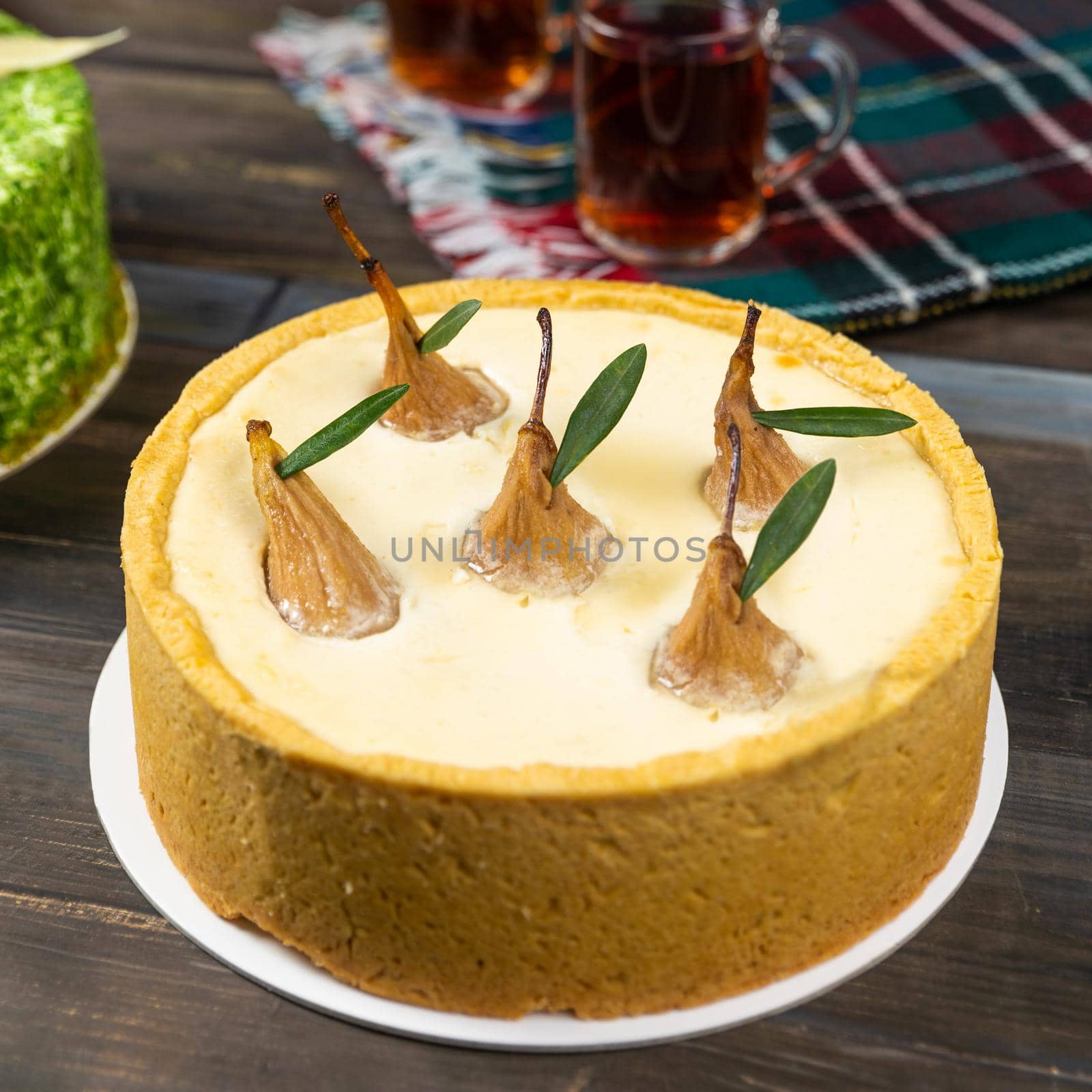 Different beautiful pear cake on the wooden table by ferhad