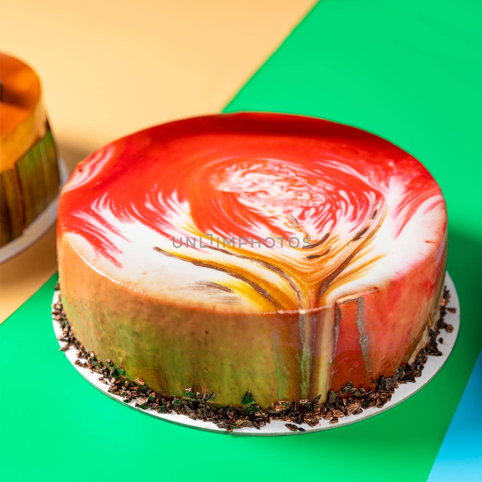 Different beautiful jam cake on the colorful background