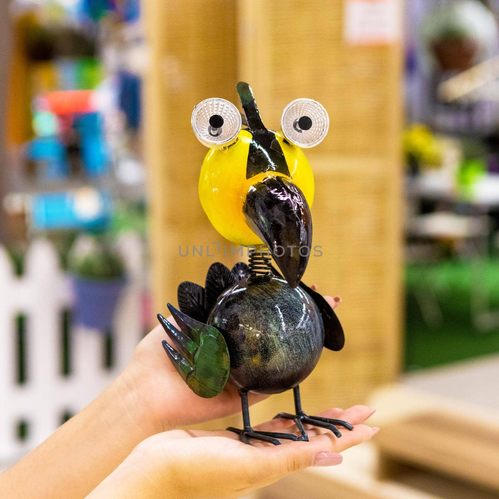 Toucans bird toy on the hand isolated by ferhad