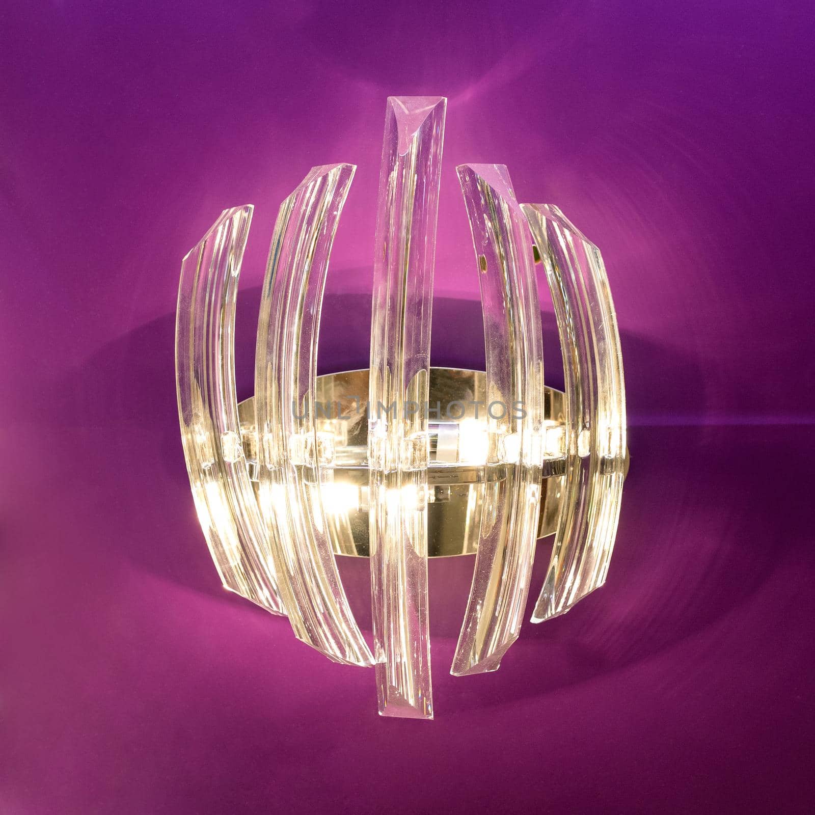 Luxury glass lamp isolated purple background