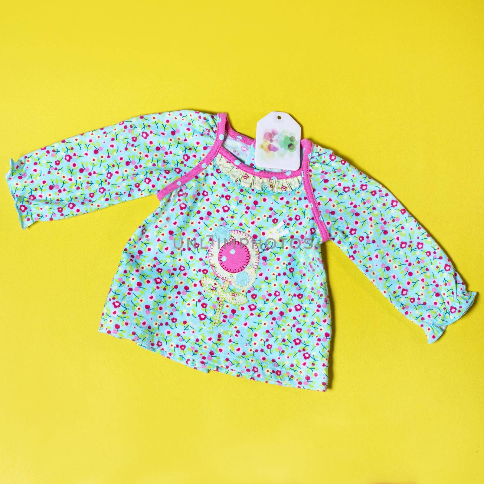 Baby girl clothes and toy stuff, baby fashion concept