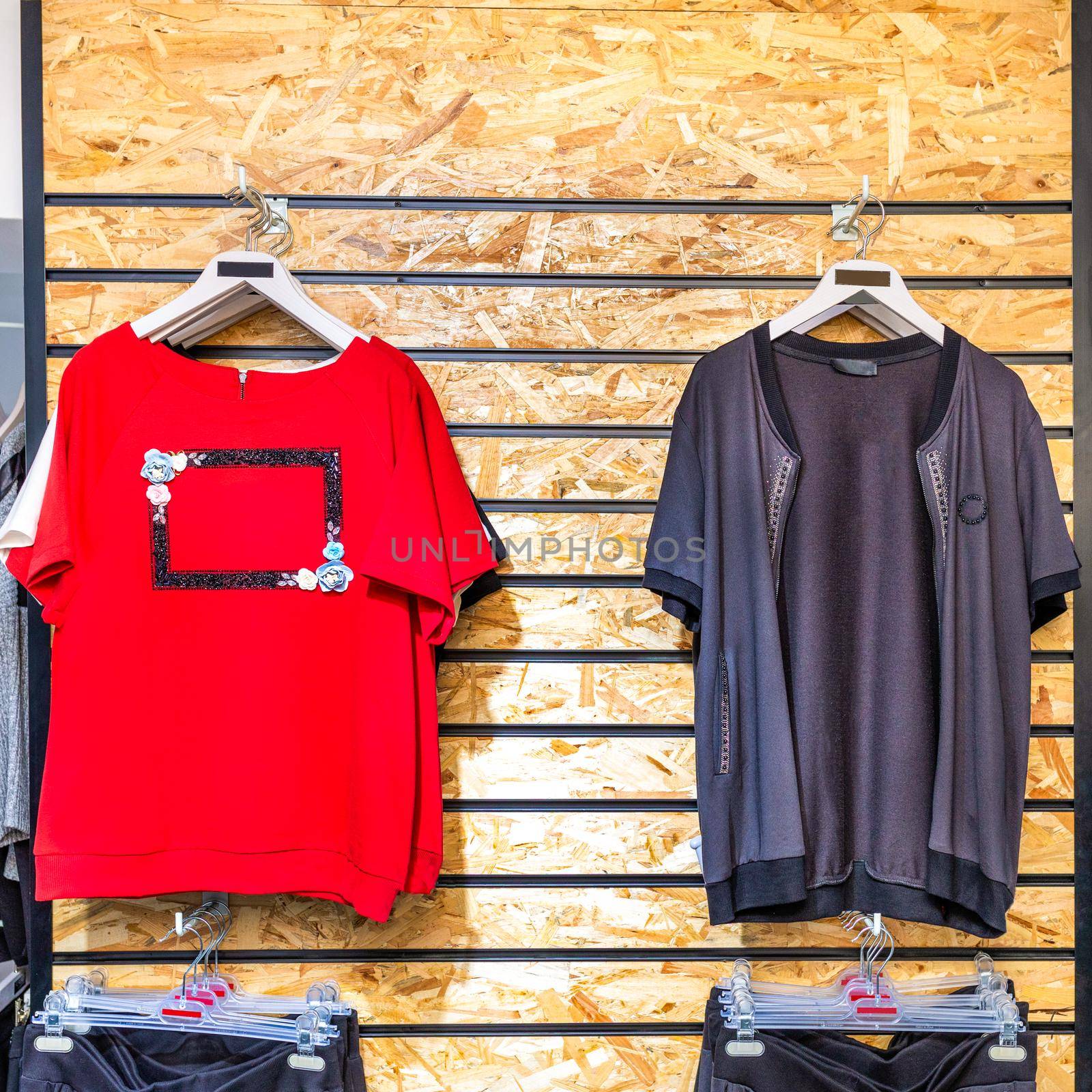 An empty woman fashion store with mannequin displaying the latest trend