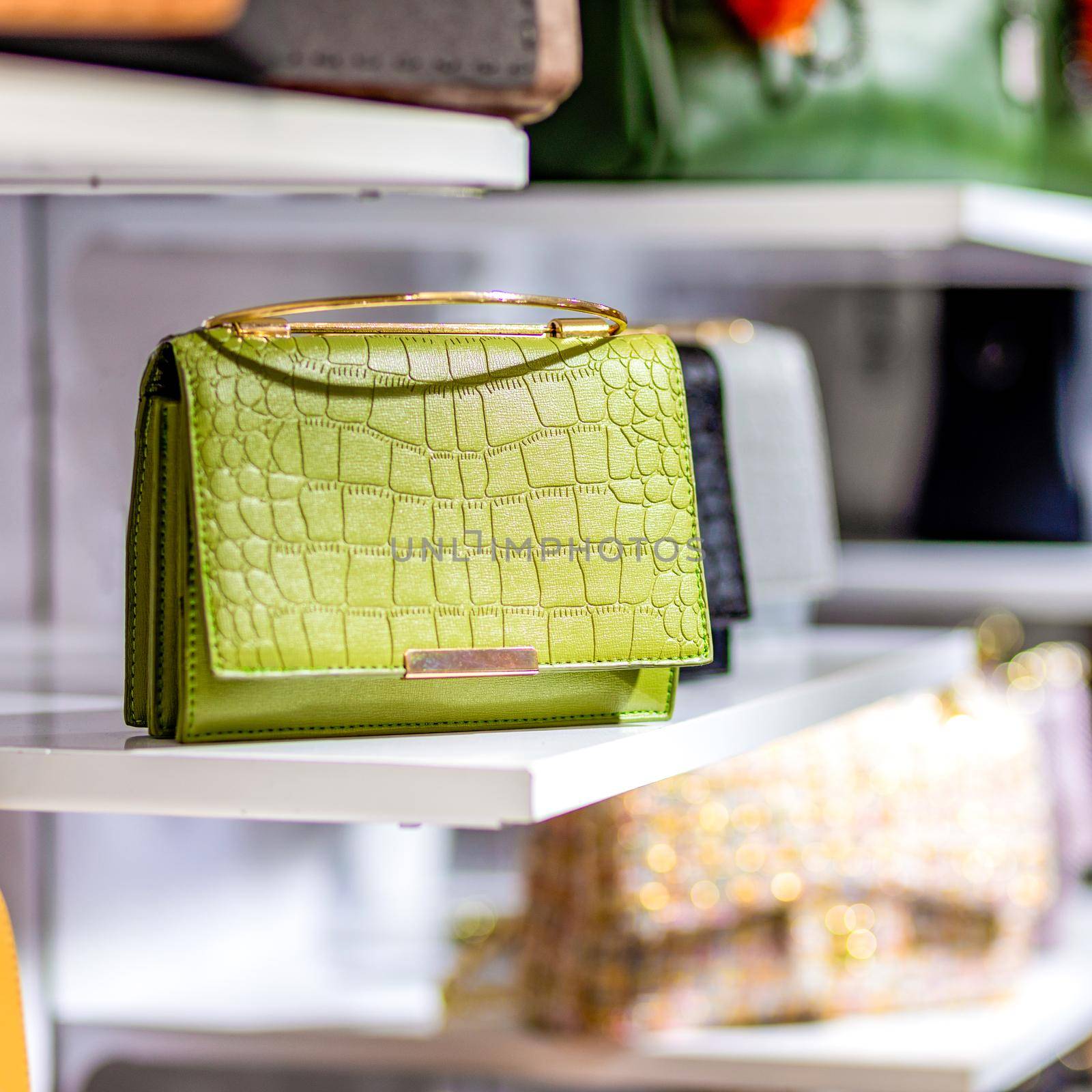 Colorful handbags in a luxury fashion store