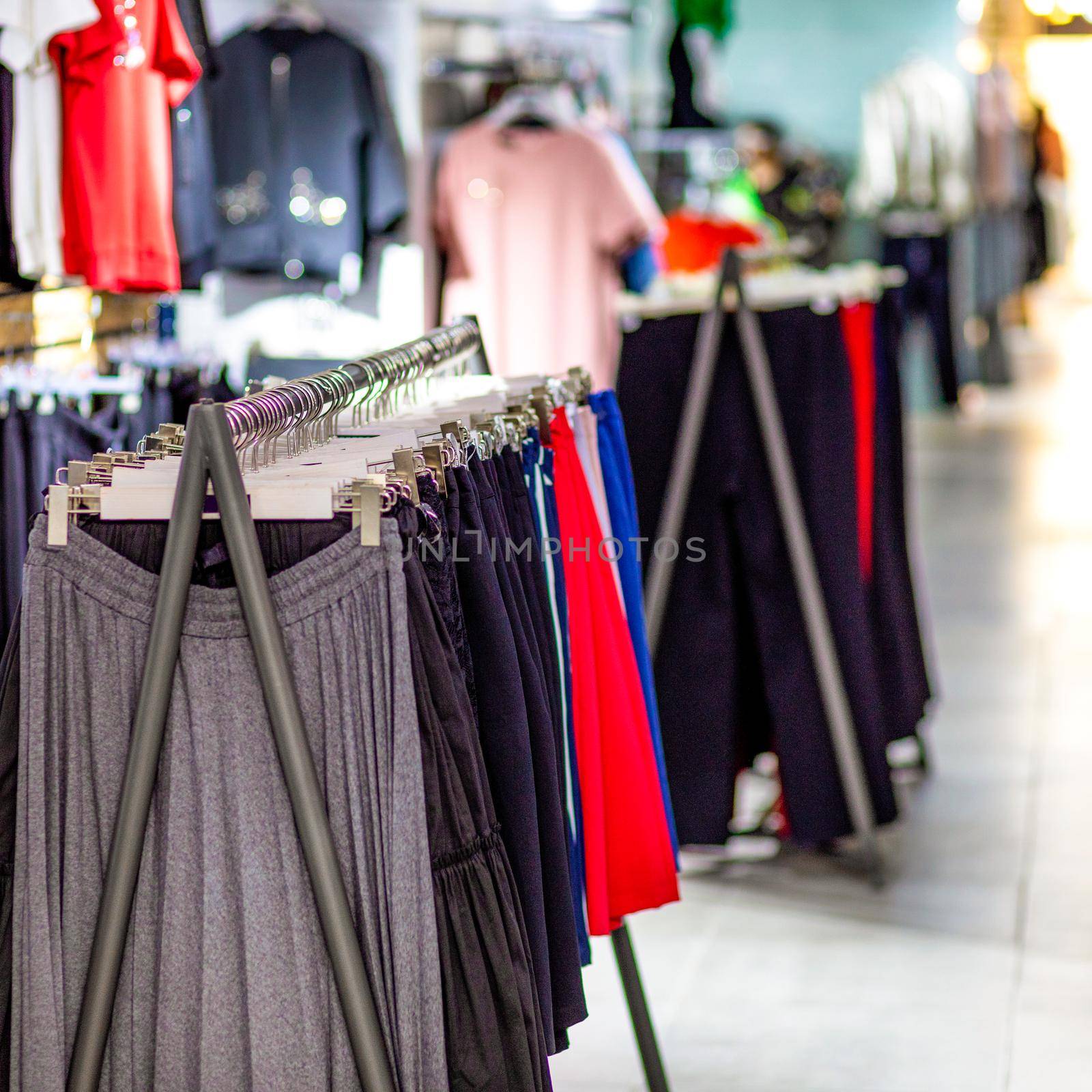 Woman clothing on hanger at the modern shop boutique