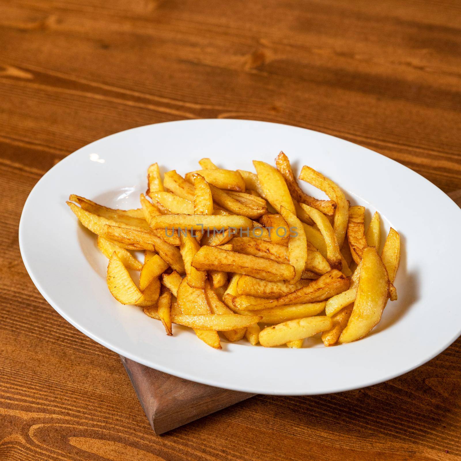 Tasty fried potatoes close up by ferhad