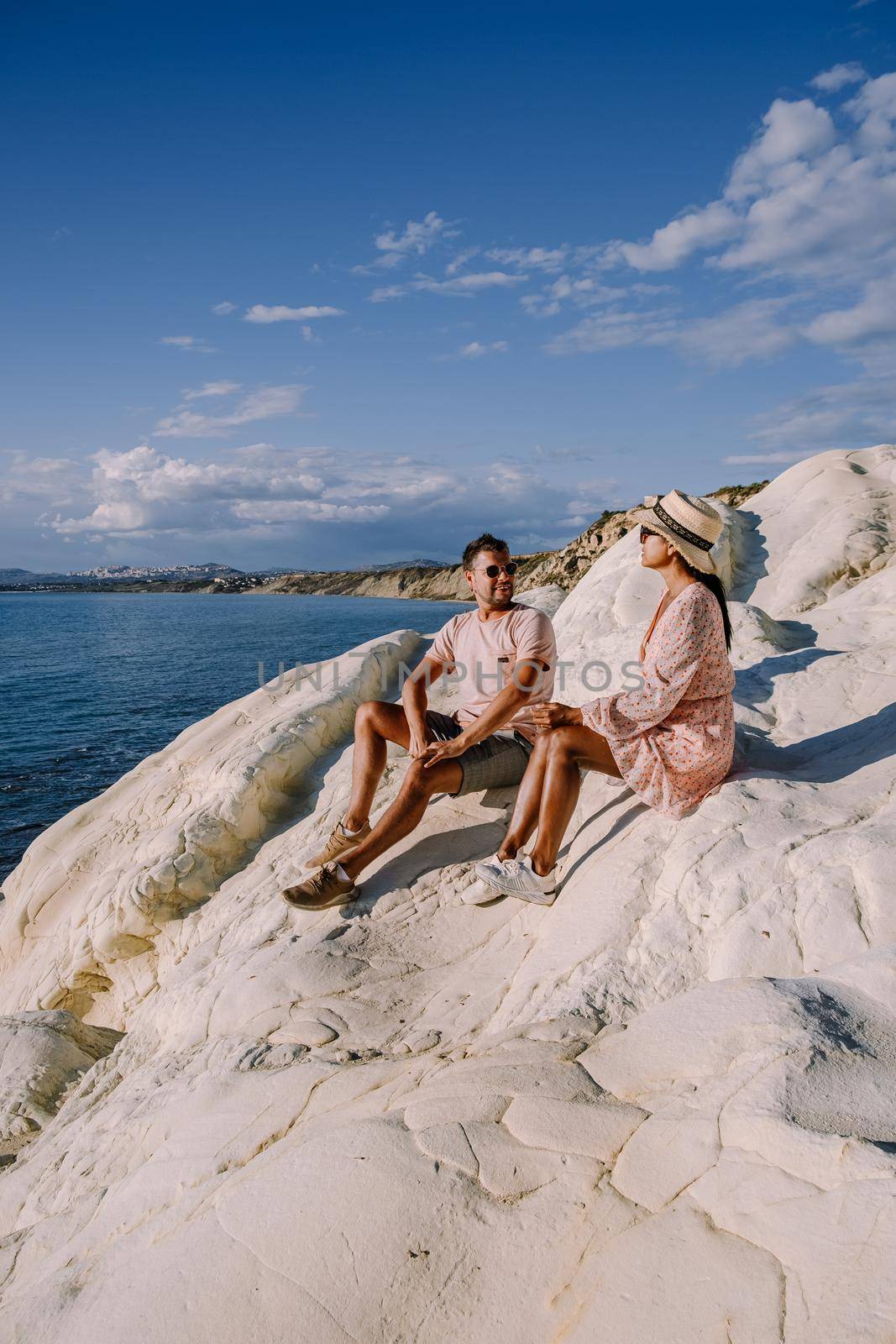 Punta Bianca, Agrigento in Sicily Italy White beach with old ruins of an abandoned stone house on white cliffs. Sicilia Italy, couple on vacation in Italy