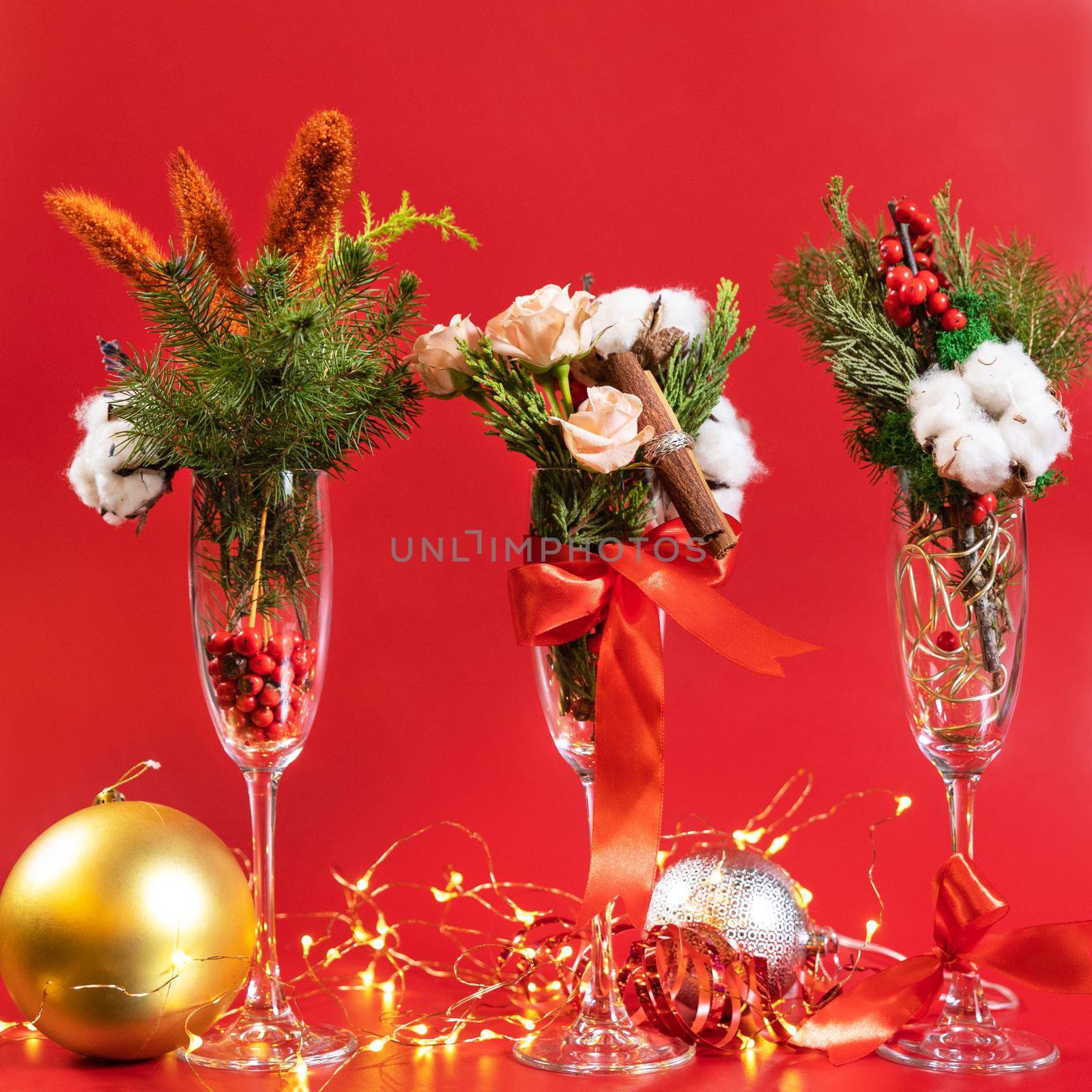 Christmas glass decor on the red background