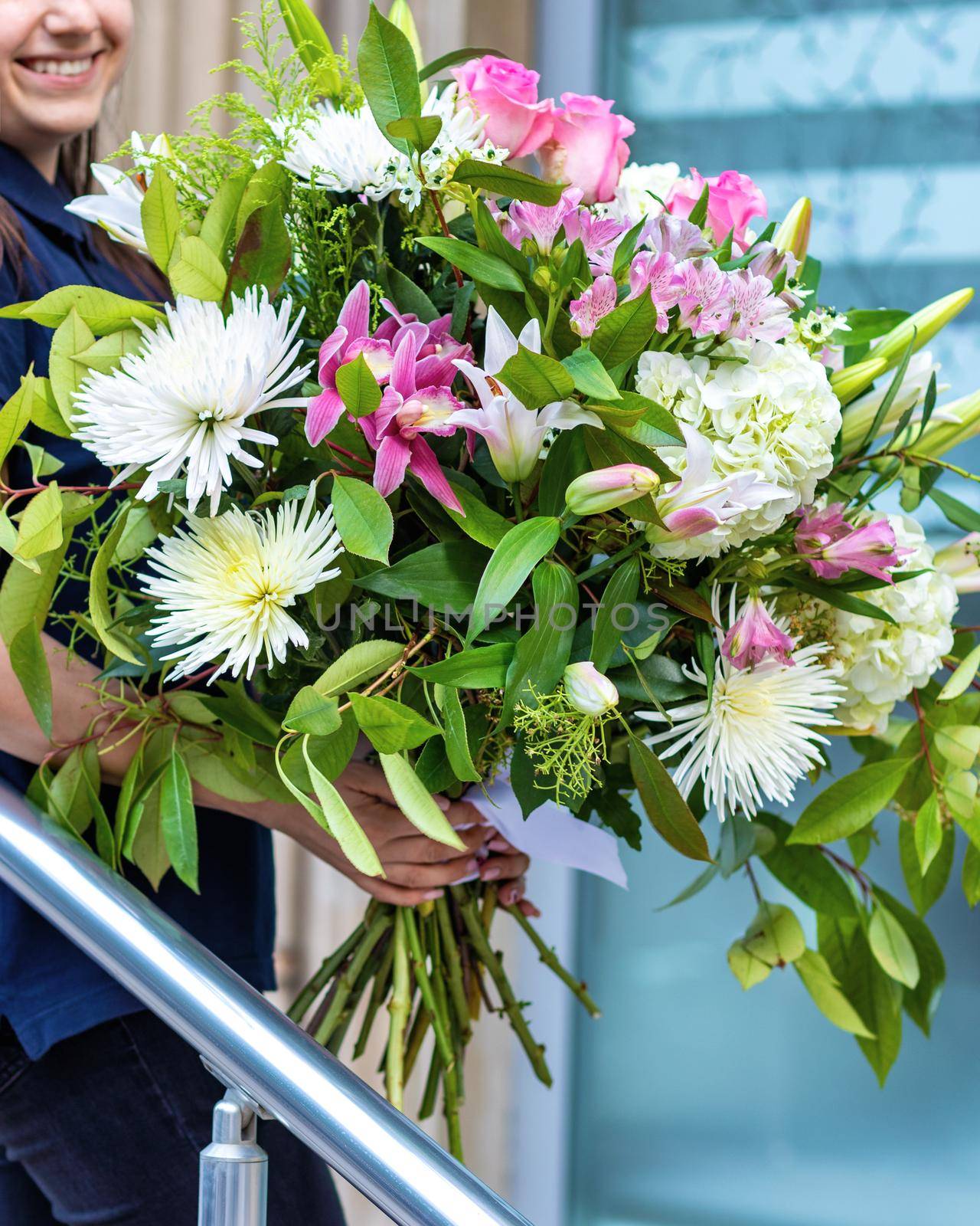 Woman holding beautiful bouquet flower