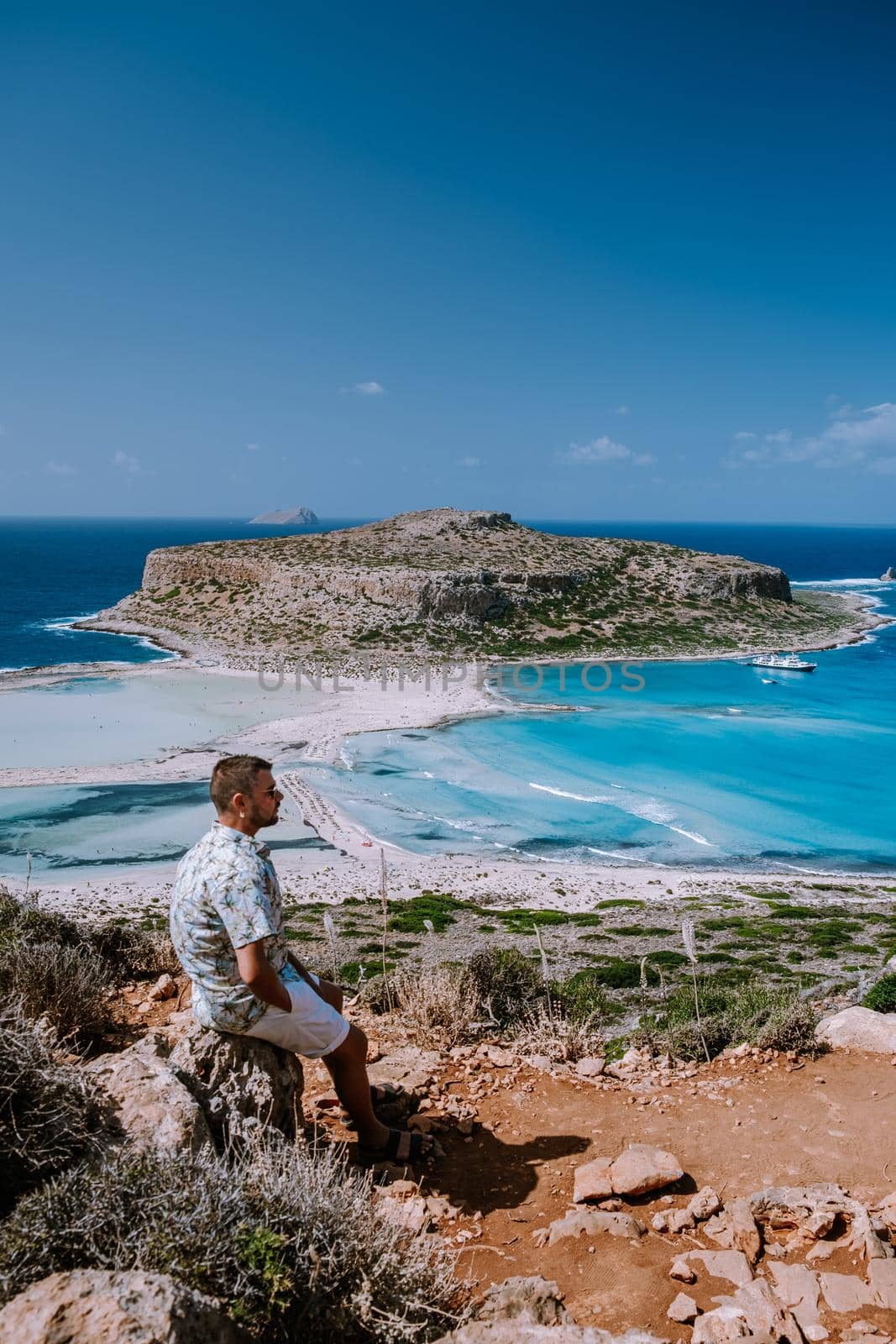 Balos Beach Cret Greece, Balos beach is on of the most beautiful beaches in Greece at the Greek Island young guy visit the beach during vacation