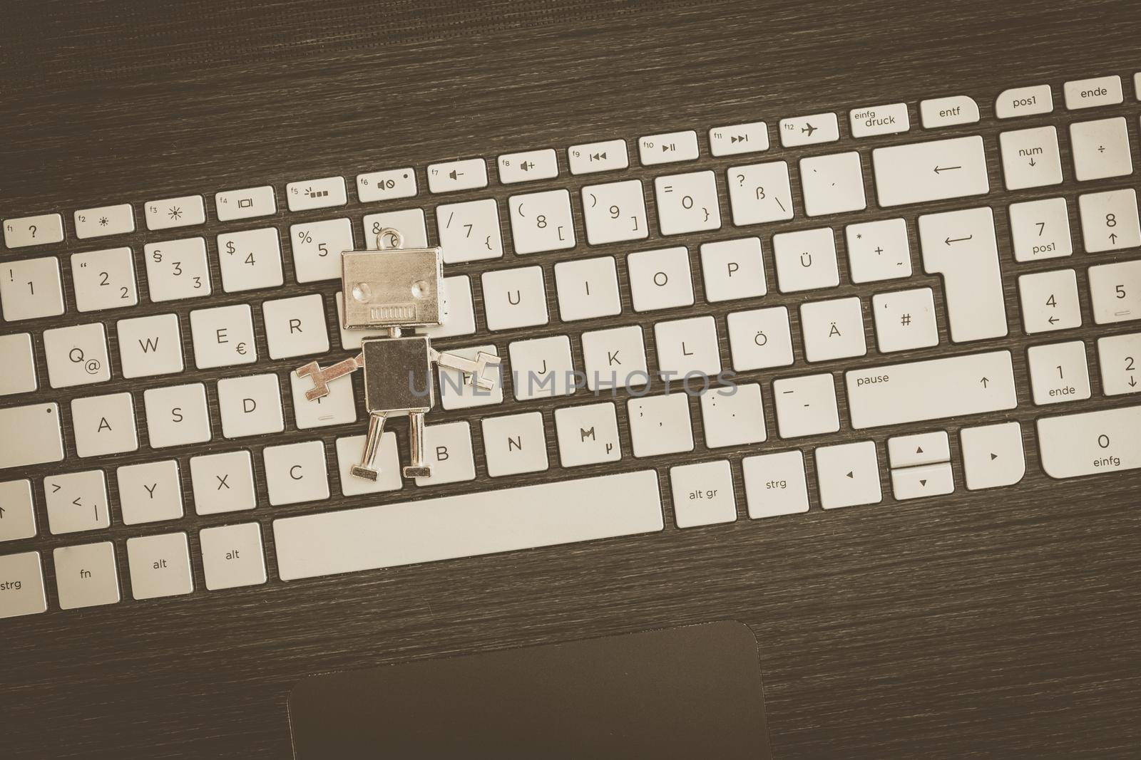 Symbol for a chatbot or social bot and algorithms, program code in the background
