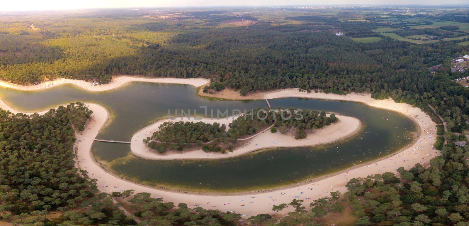 A lake situated in the Netherlands, Utrecht, called Henschotermeer. by drone aerial utrechtse heuvelrug, henschotermeer, lake in holland. Europe