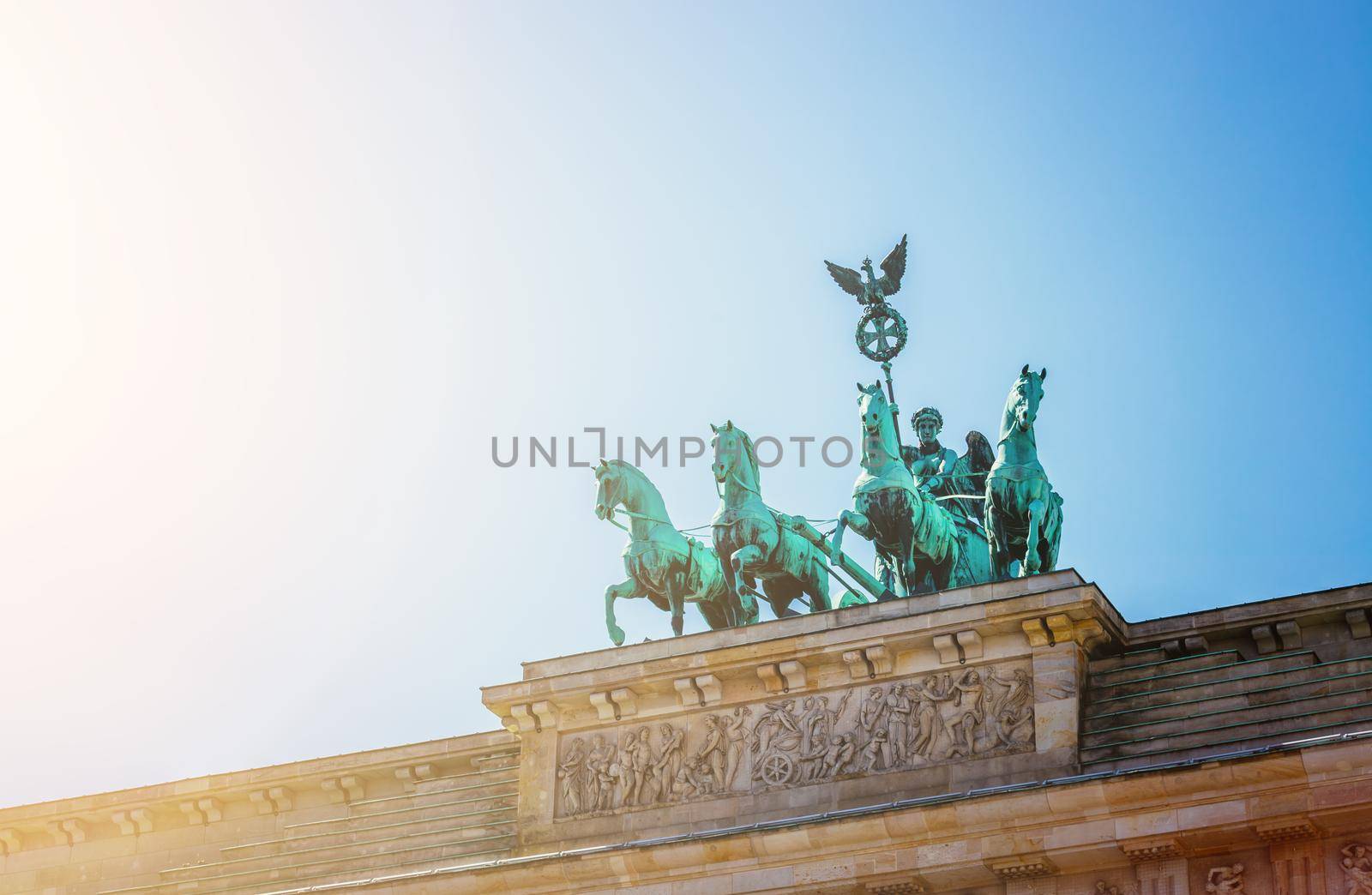 Front picture of the Brandenburger Gate in Berlin, Germany in summer time.