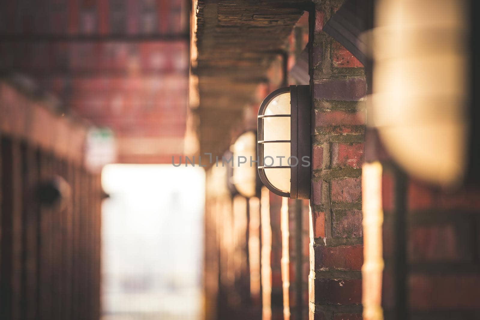 Lamps on a masoned building, blurry background
