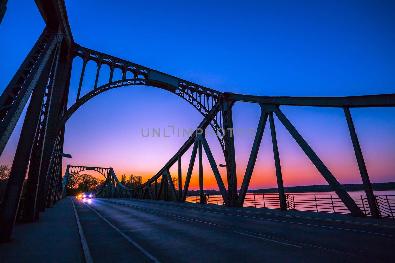 Silhouette of Glienicker Bridge in Berlin, evening scenery