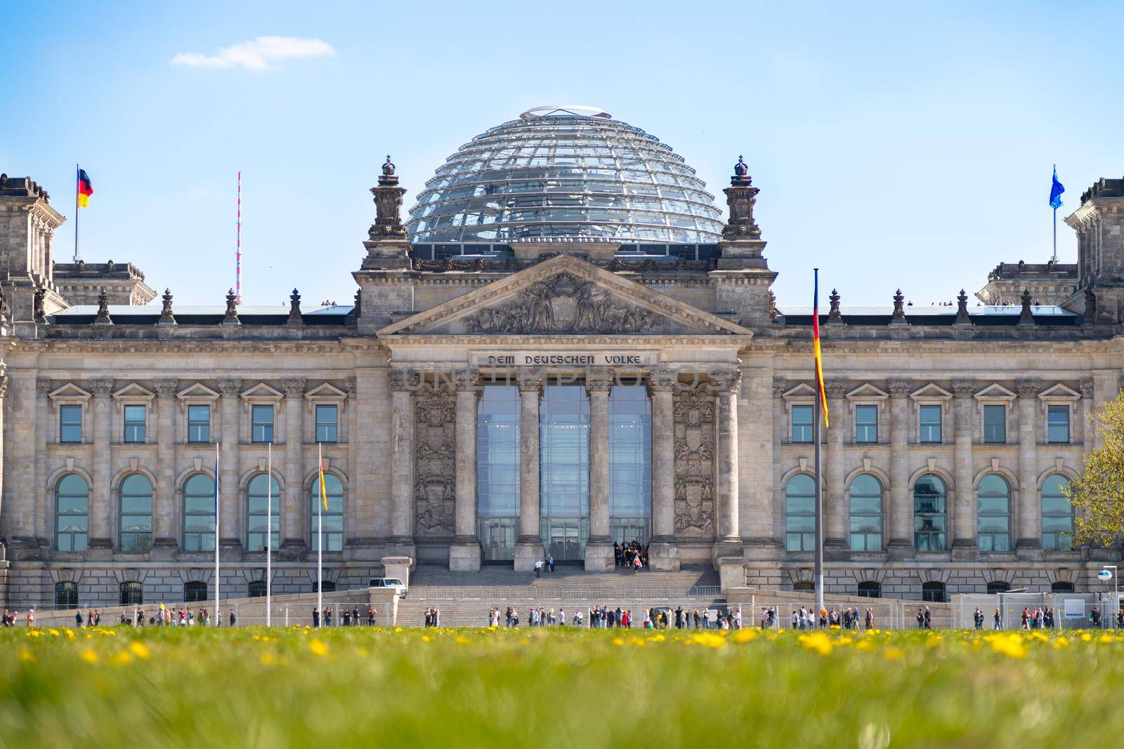 Picture of the Reichstag in Berlin in Springtime, green grass and flowers
