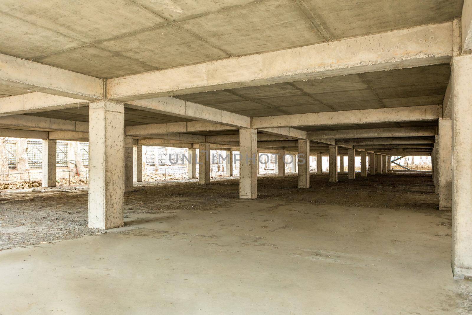 Building garage inside interior view at the construction site by ferhad