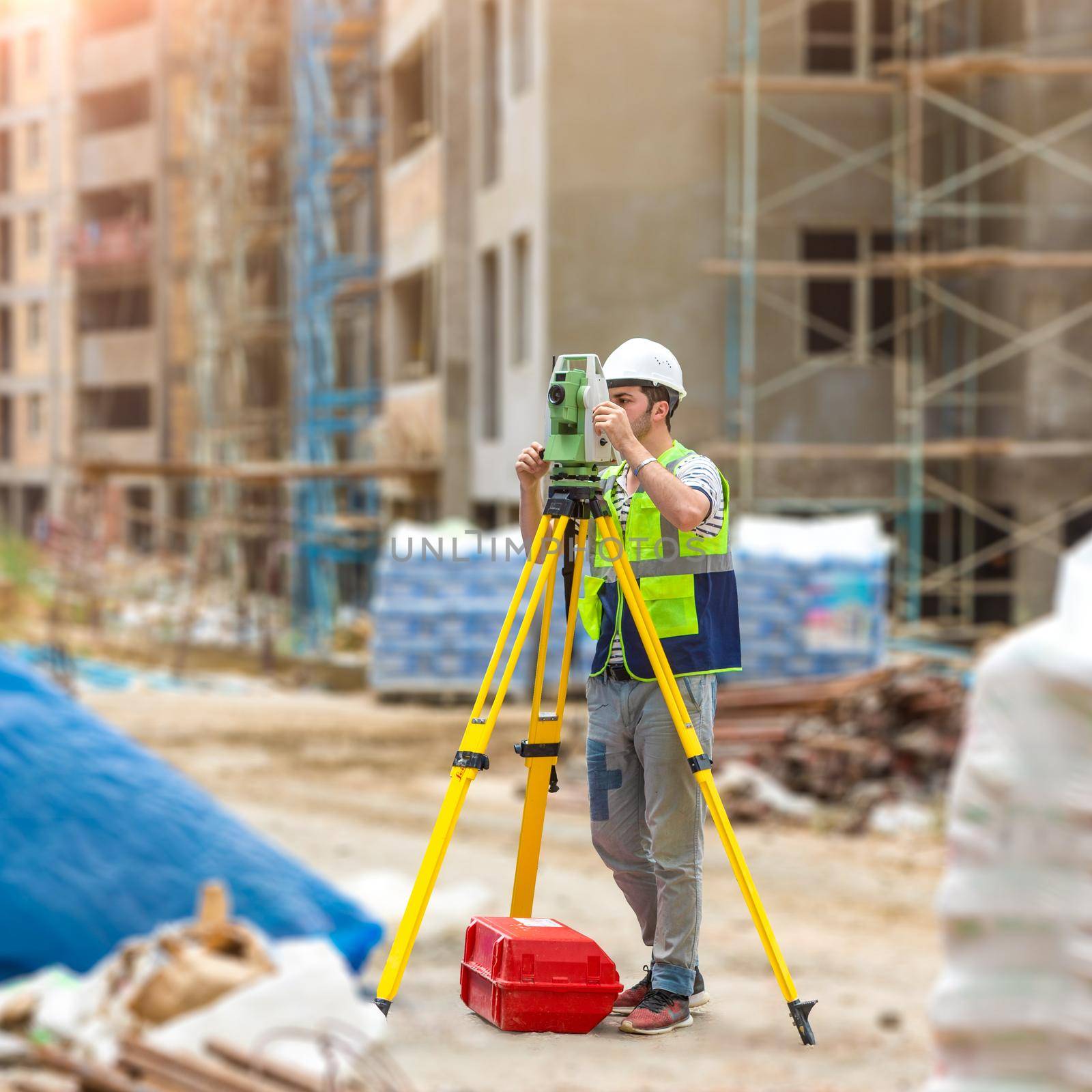 Construction topography worker on the building site