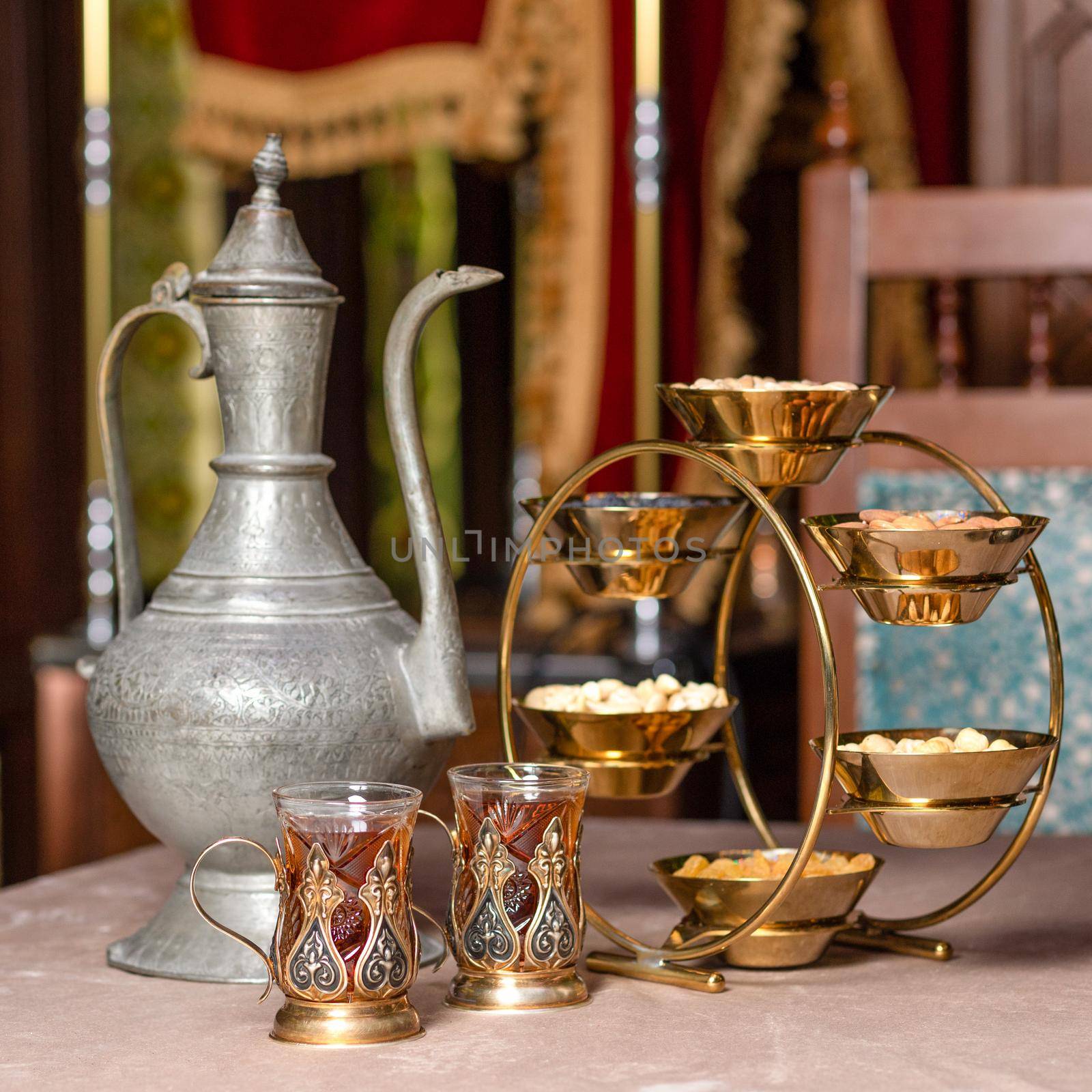 Arabic teapot glass and nuts pot close up by ferhad