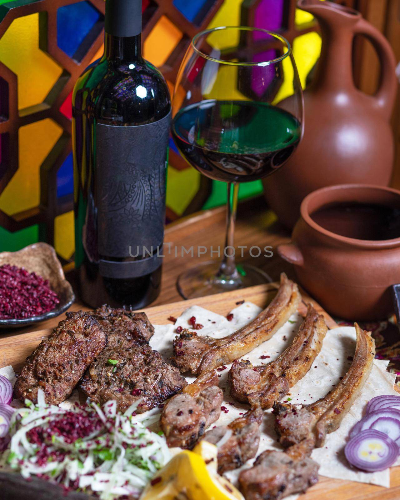 Lyulya kebab, sheep meat meal with wine bottle and glass by ferhad