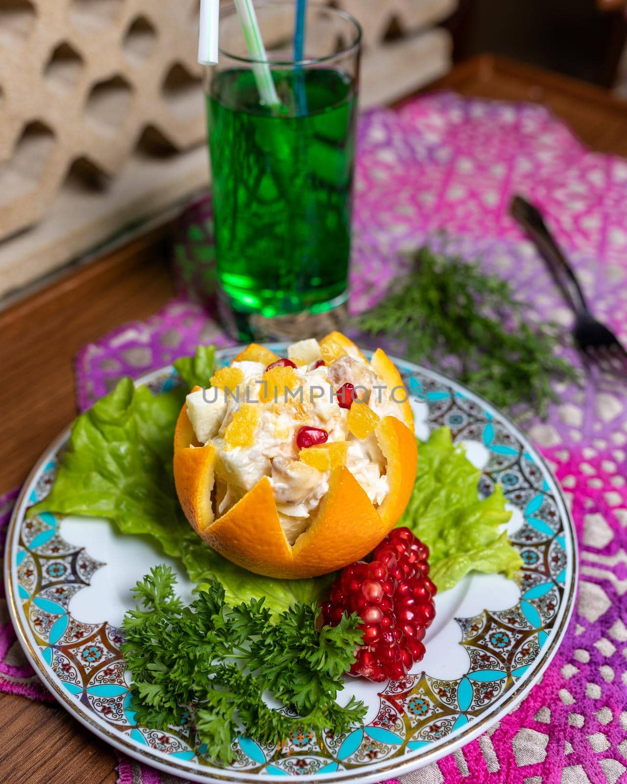 Orange snack with pomegranate close up by ferhad