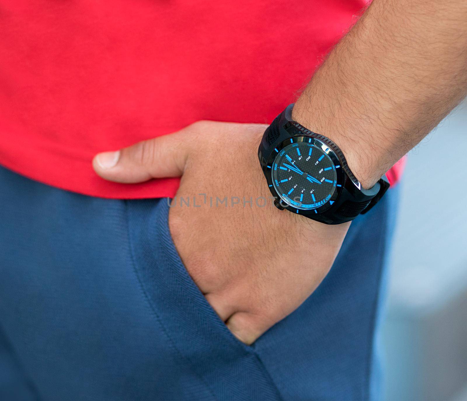 Blue sport hand watch close up