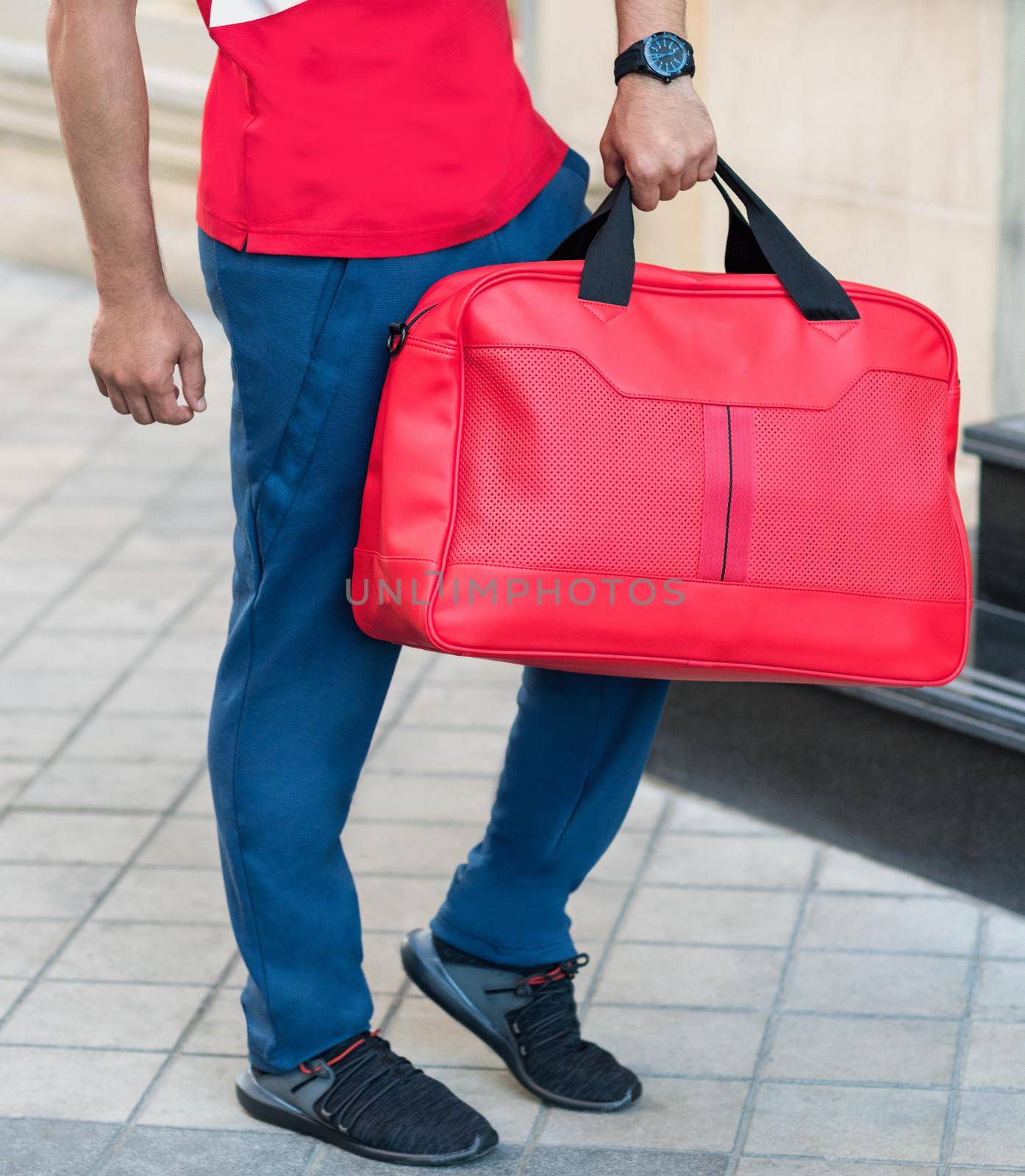 Red luxury sportsman duffel bag close up by ferhad