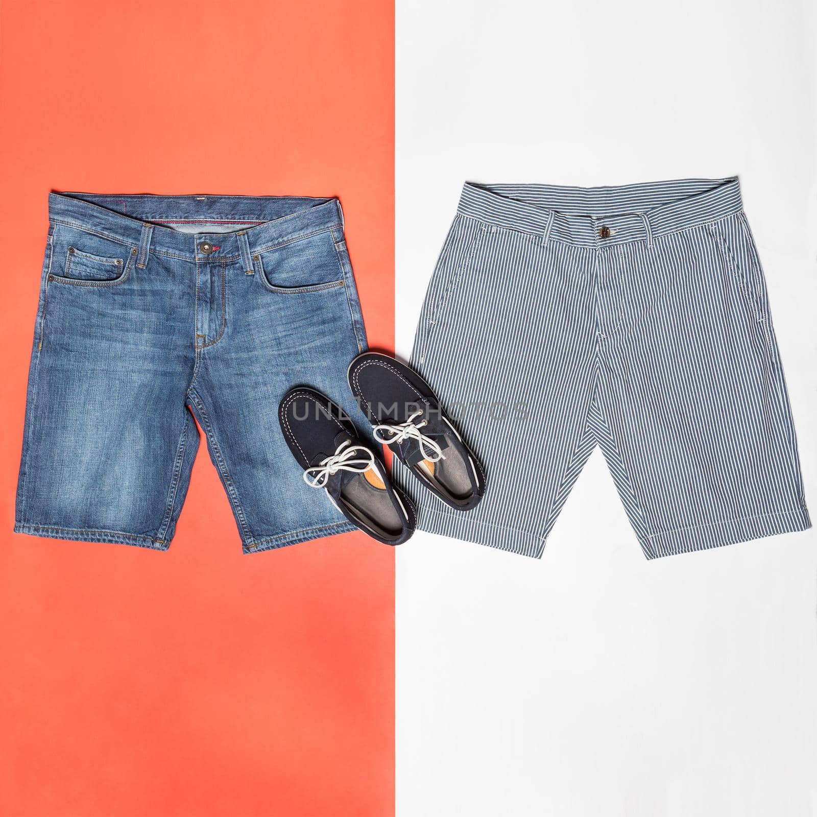 Man jeans shorts with a black shoes isolated background