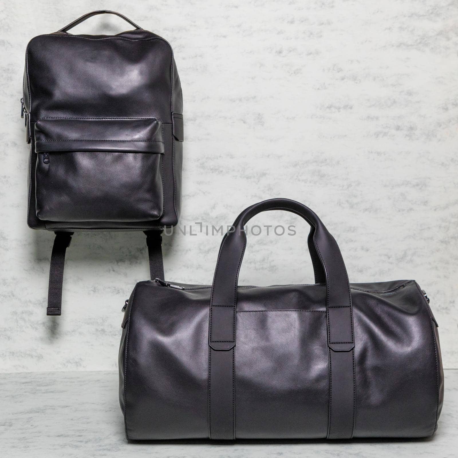 Black man handbag and backpack isolated
