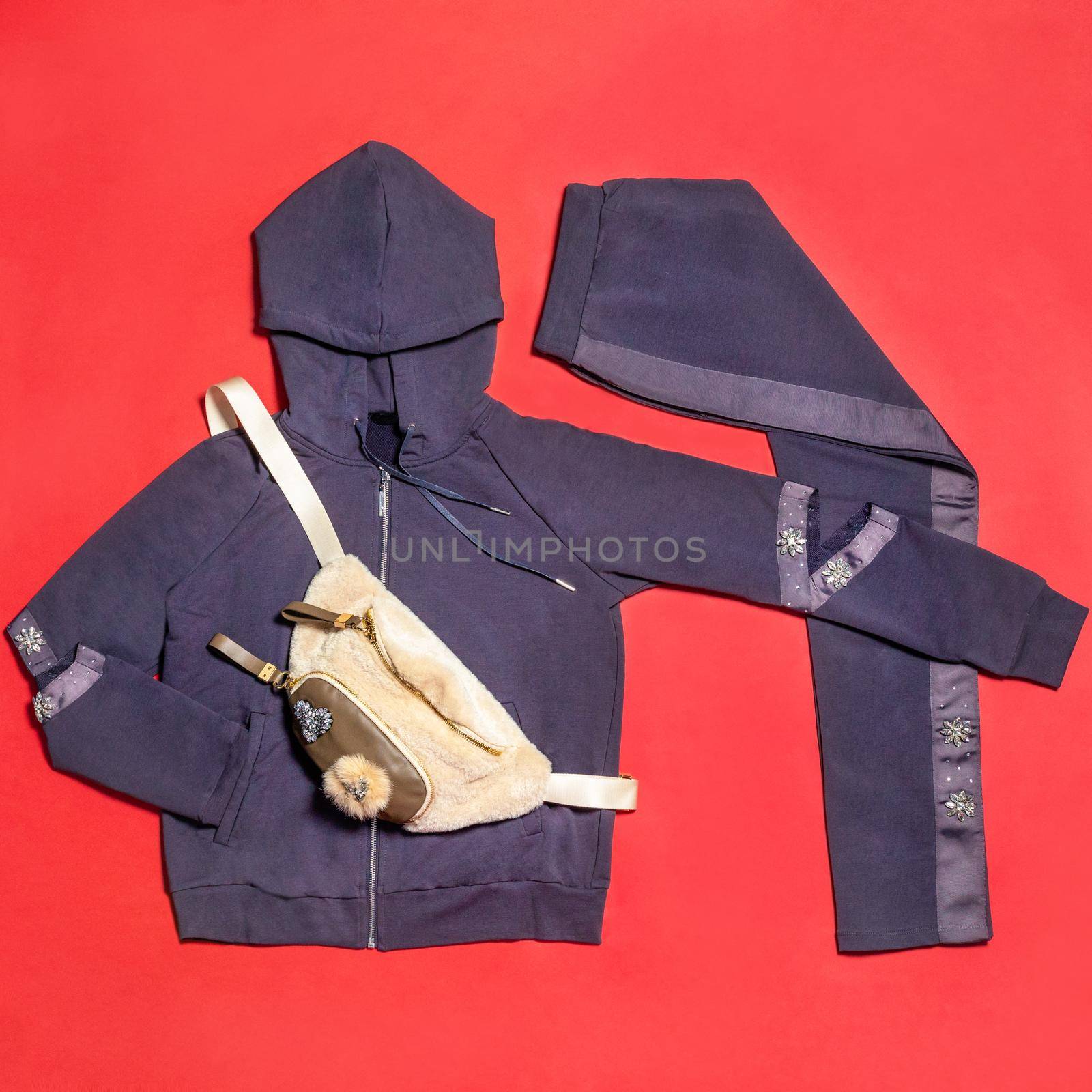 Blue woman hood jacket with a pants isolated