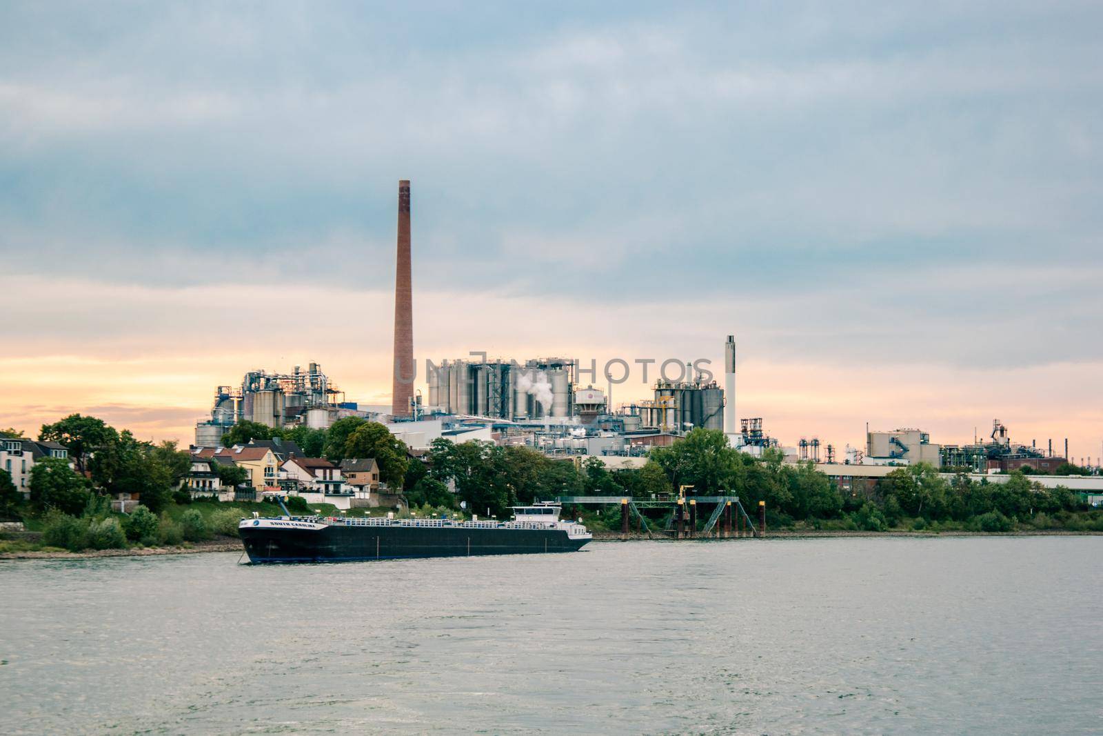 Cologne Germany August 2020, Inland shipping transport on the rhine river with containers, Large container and oiltanker vessel on the river rhein in Germany Europe