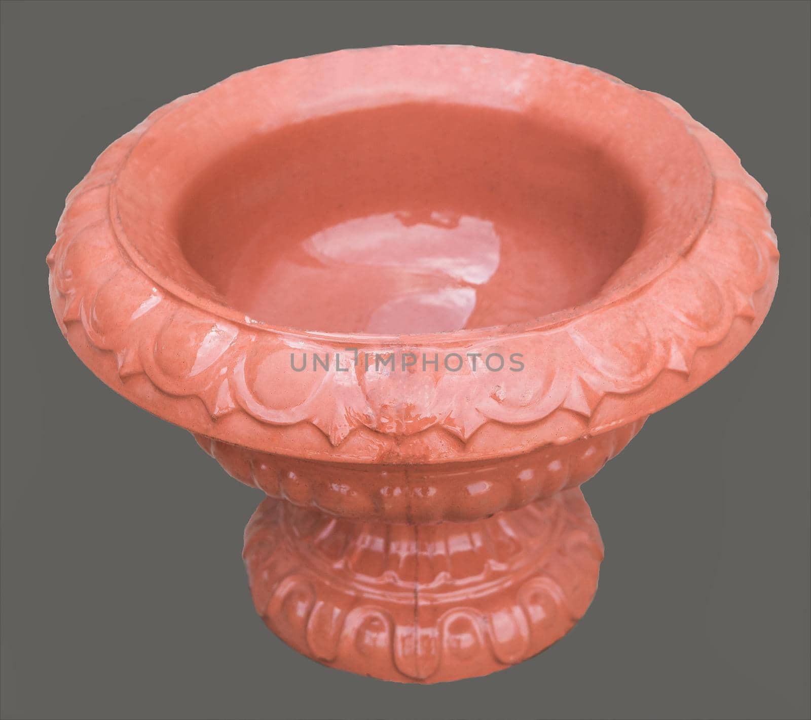 A sample of vase shaped stone on the unicolour background