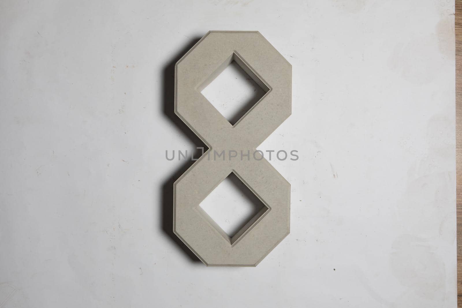 A sample of ground, wall stone shape on the unicolour background