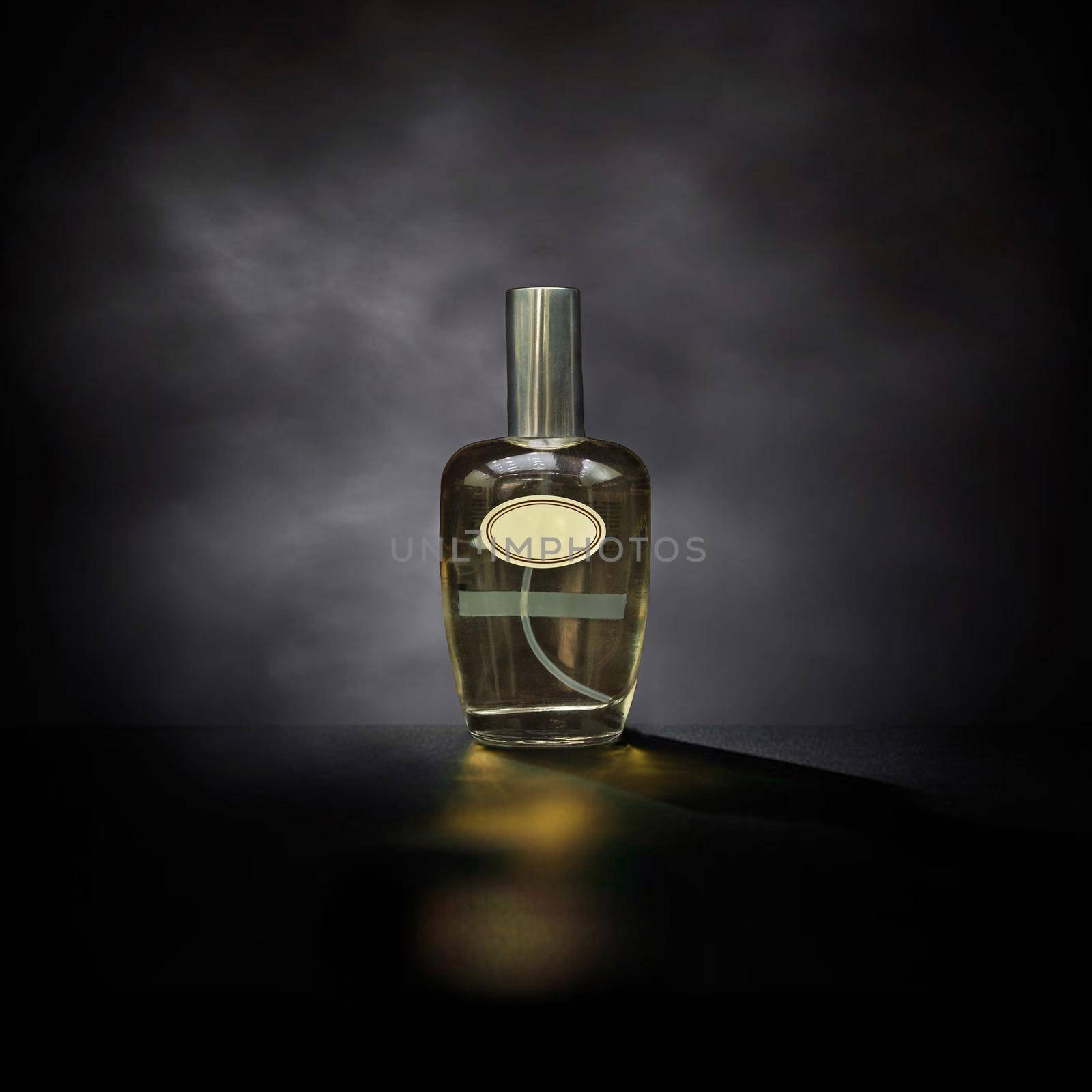 Perfume flacon abstract dark background